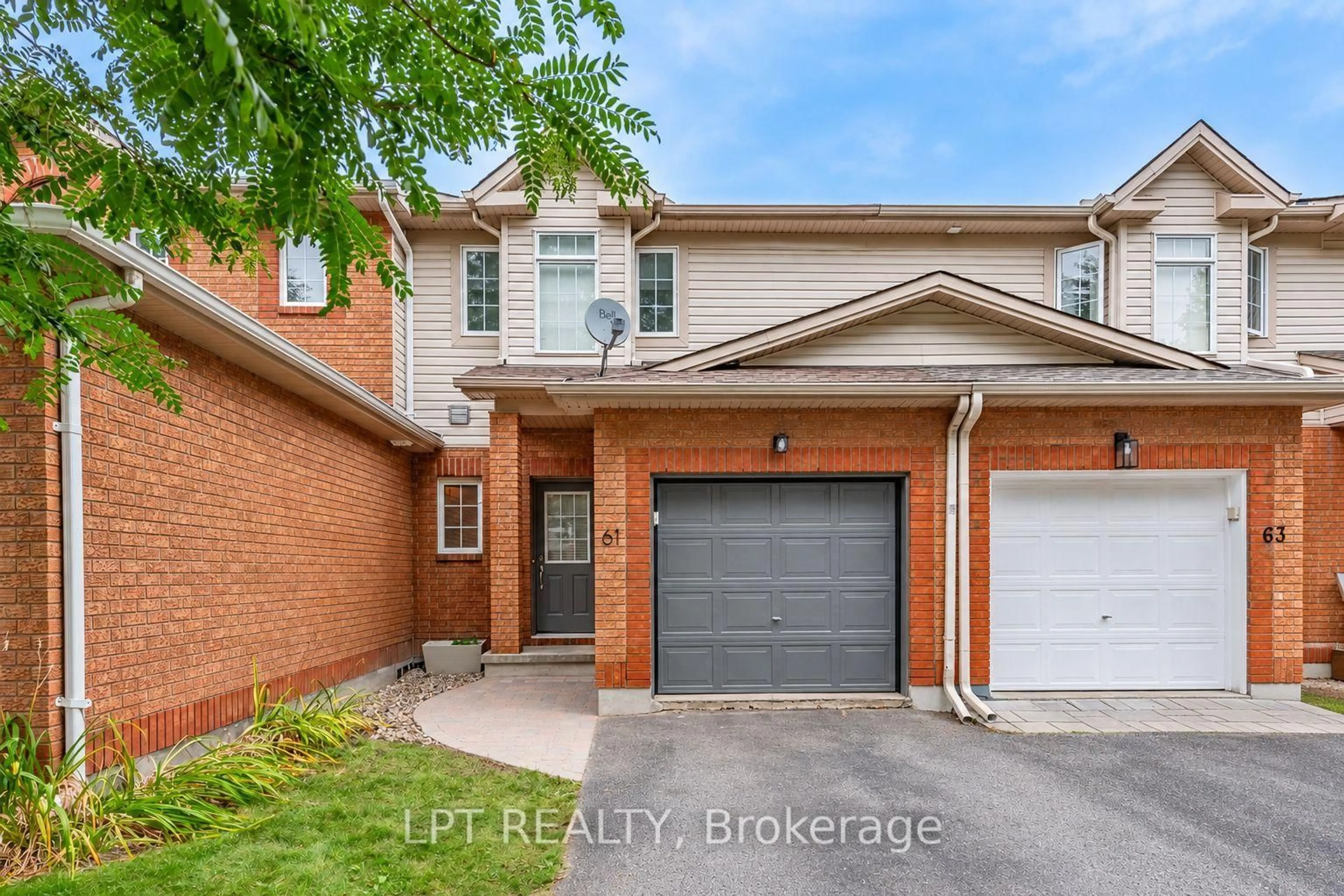 Home with brick exterior material, street for 61 Tobermory Cres, Ottawa Ontario K2K 3M4