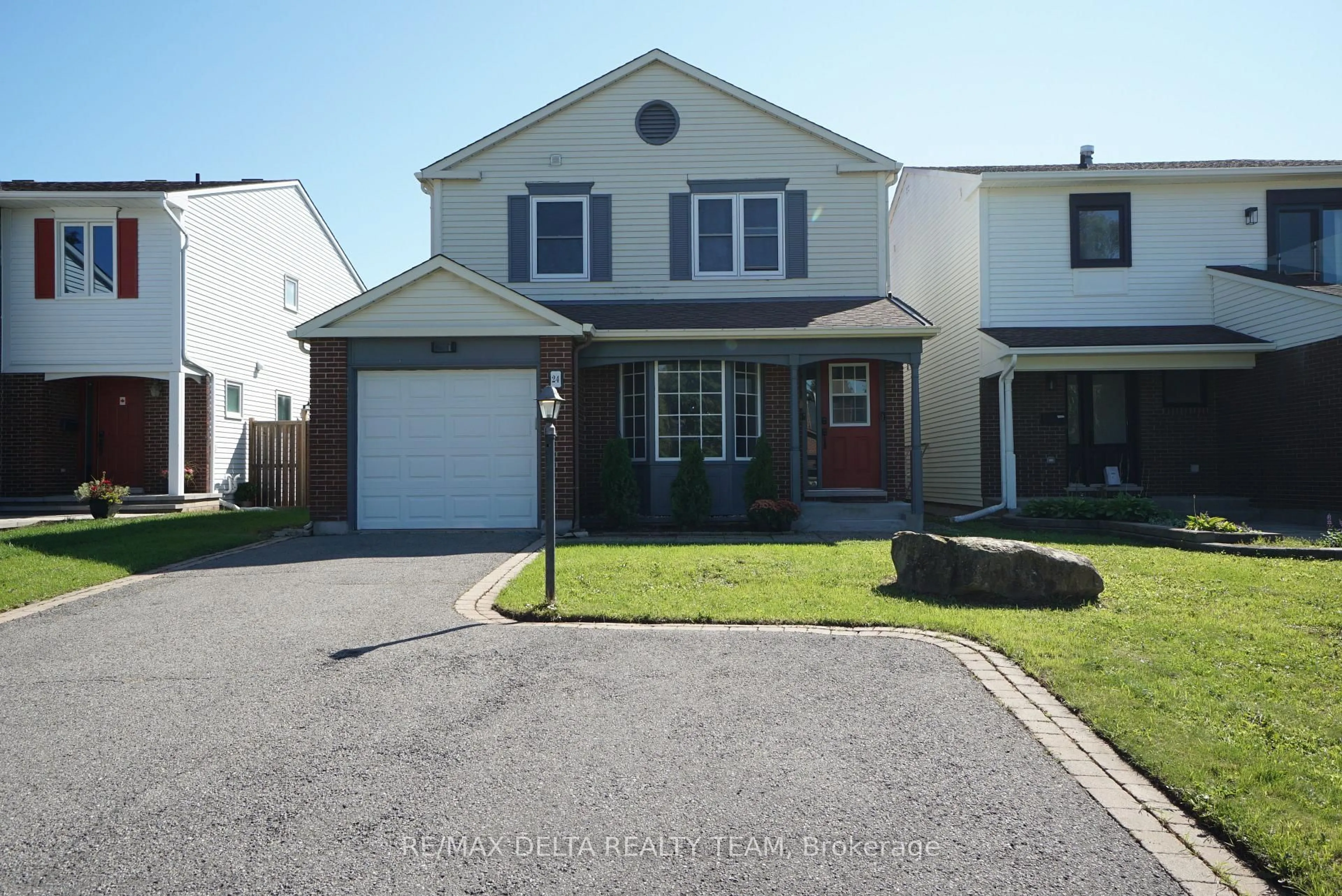 Home with vinyl exterior material, street for 24 Raftus Sq, Ottawa Ontario K2J 1J3