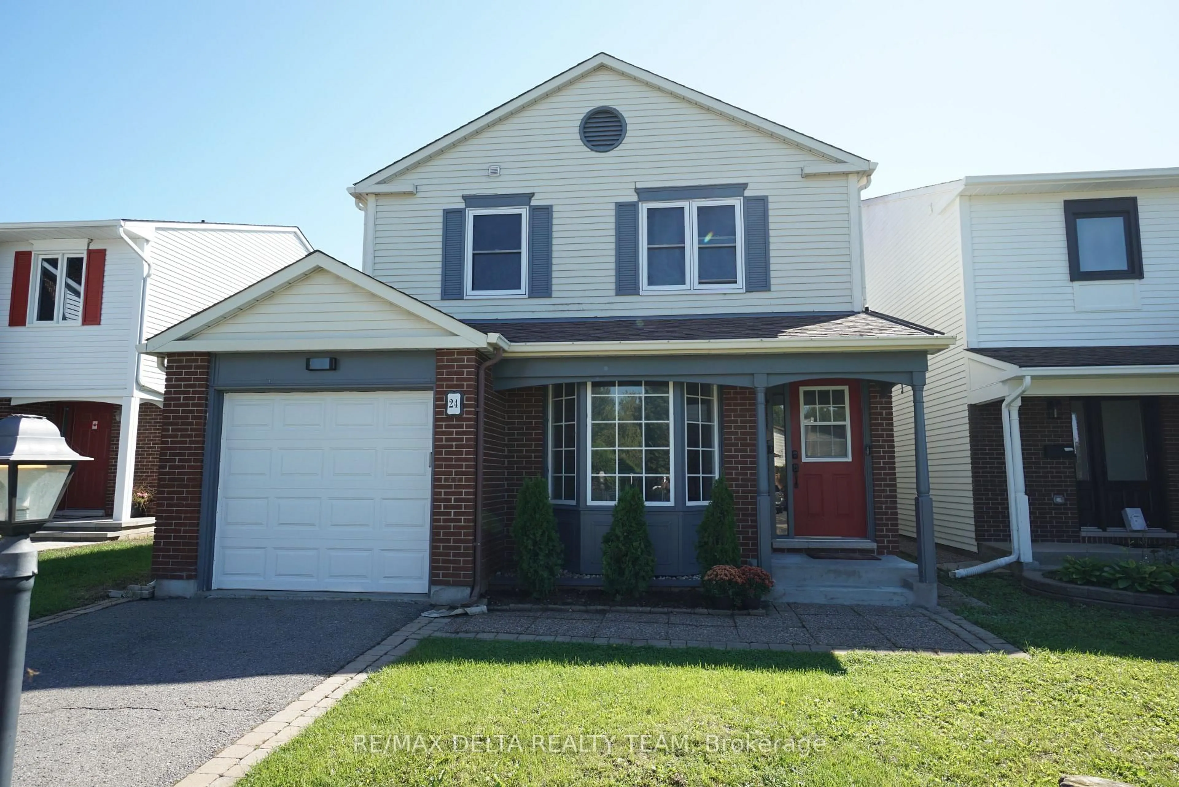 Home with vinyl exterior material, street for 24 Raftus Sq, Ottawa Ontario K2J 1J3