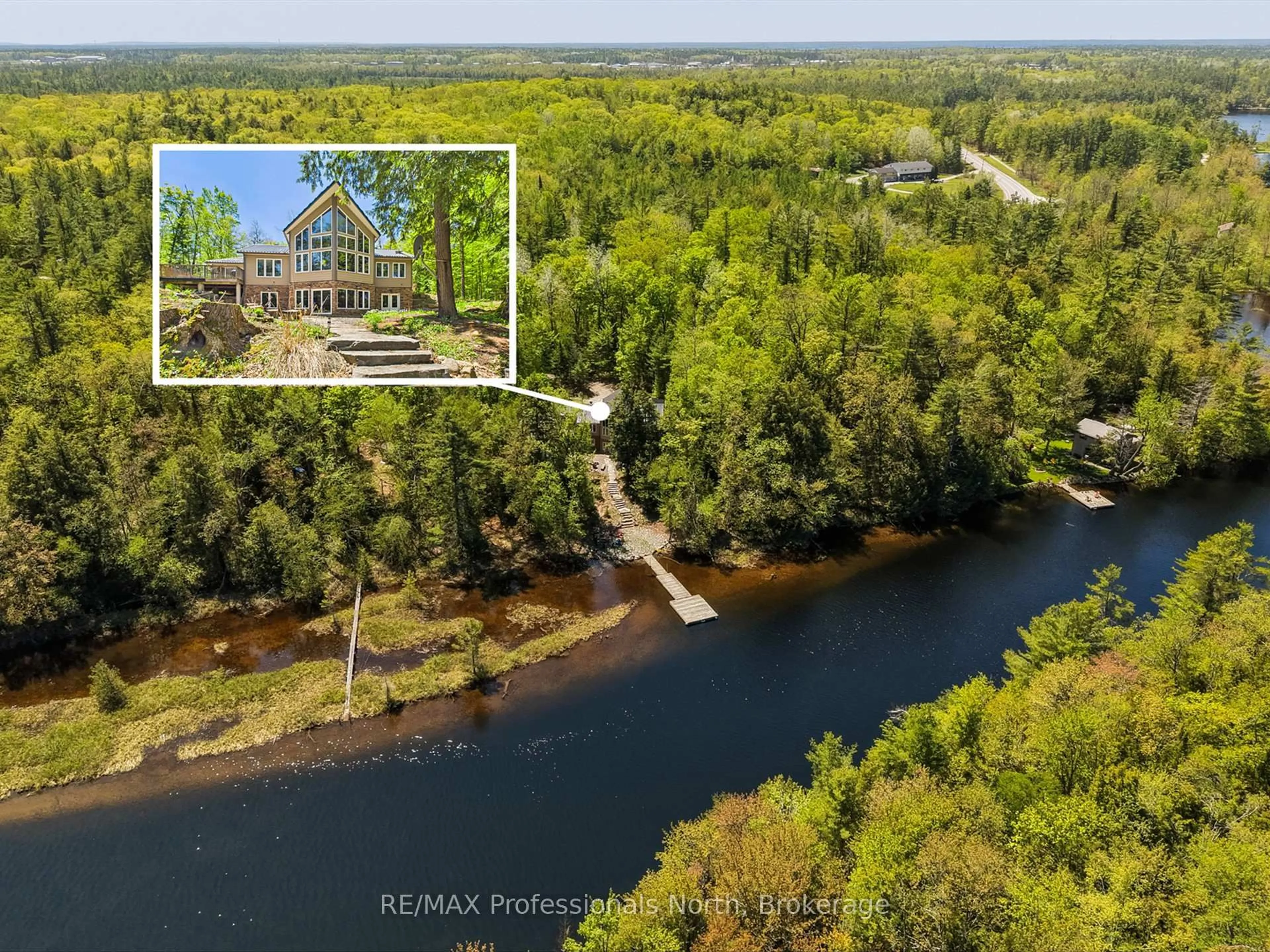 A pic from outside/outdoor area/front of a property/back of a property/a pic from drone, water/lake/river/ocean view for 1215 118 Highway, Bracebridge Ontario P1L 0K3