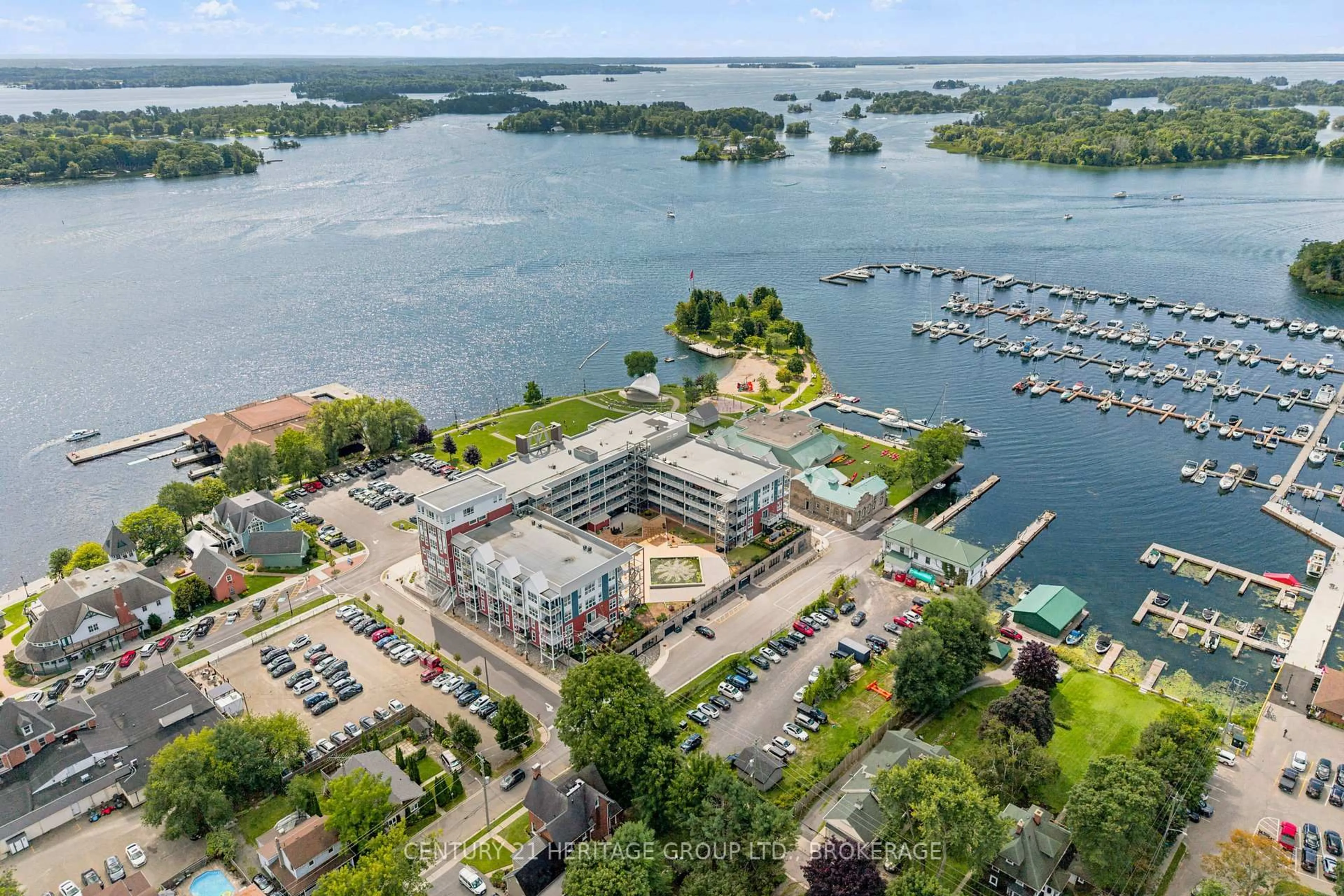 A pic from outside/outdoor area/front of a property/back of a property/a pic from drone, water/lake/river/ocean view for 130 Water St #312, Gananoque Ontario K7G 2M5