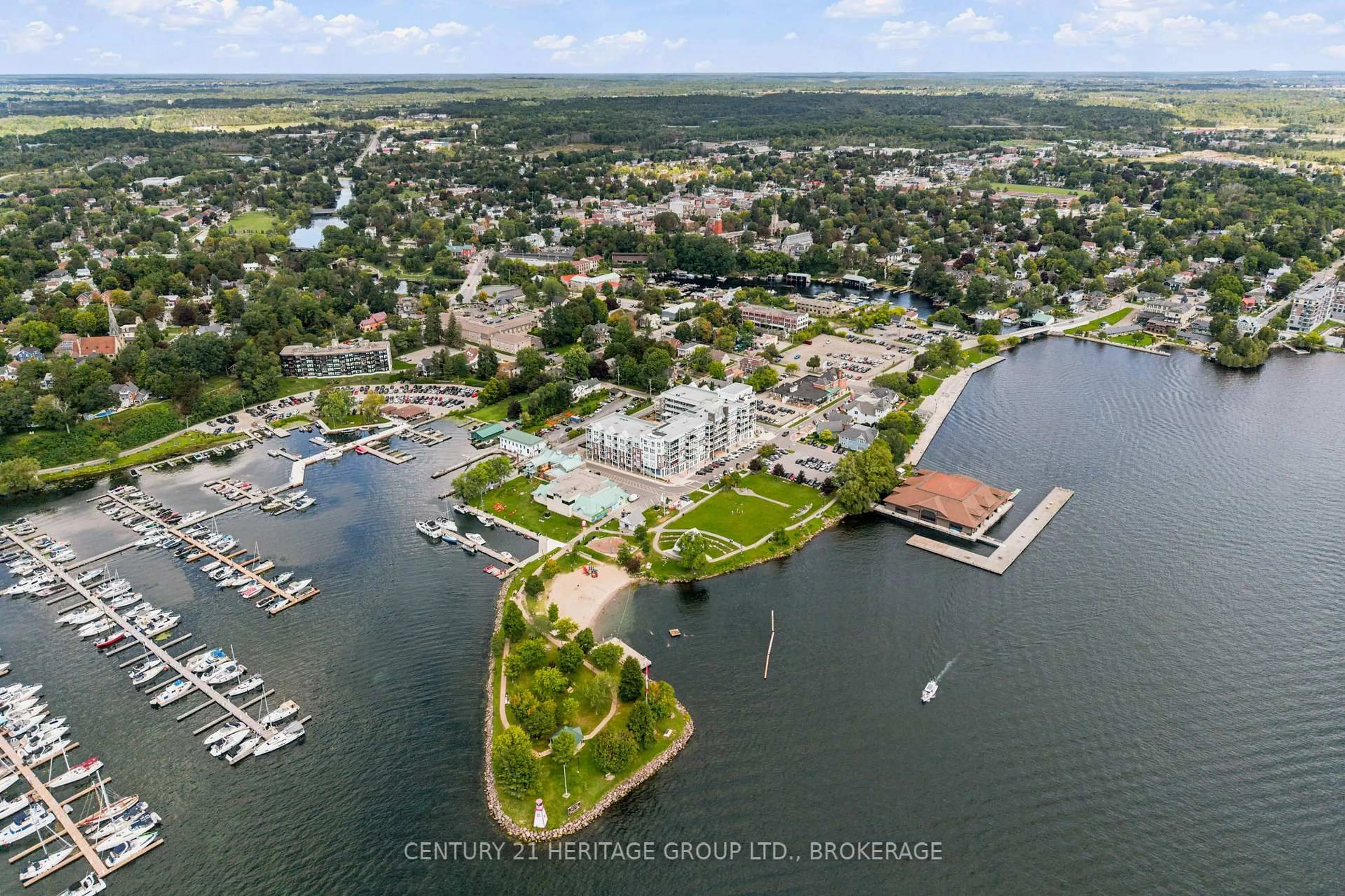A pic from outside/outdoor area/front of a property/back of a property/a pic from drone, water/lake/river/ocean view for 130 Water St #312, Gananoque Ontario K7G 2M5