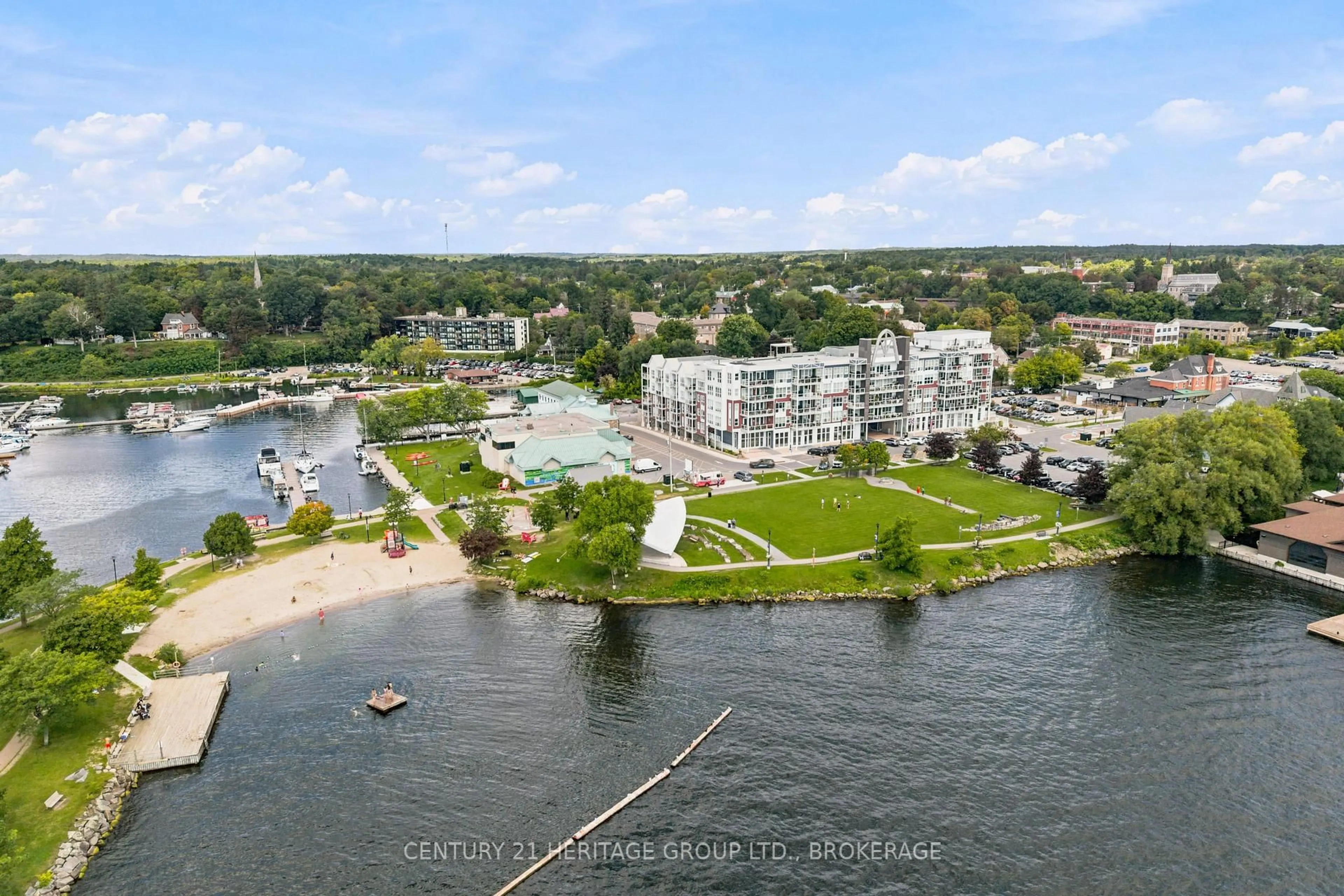 A pic from outside/outdoor area/front of a property/back of a property/a pic from drone, water/lake/river/ocean view for 130 Water St #312, Gananoque Ontario K7G 2M5