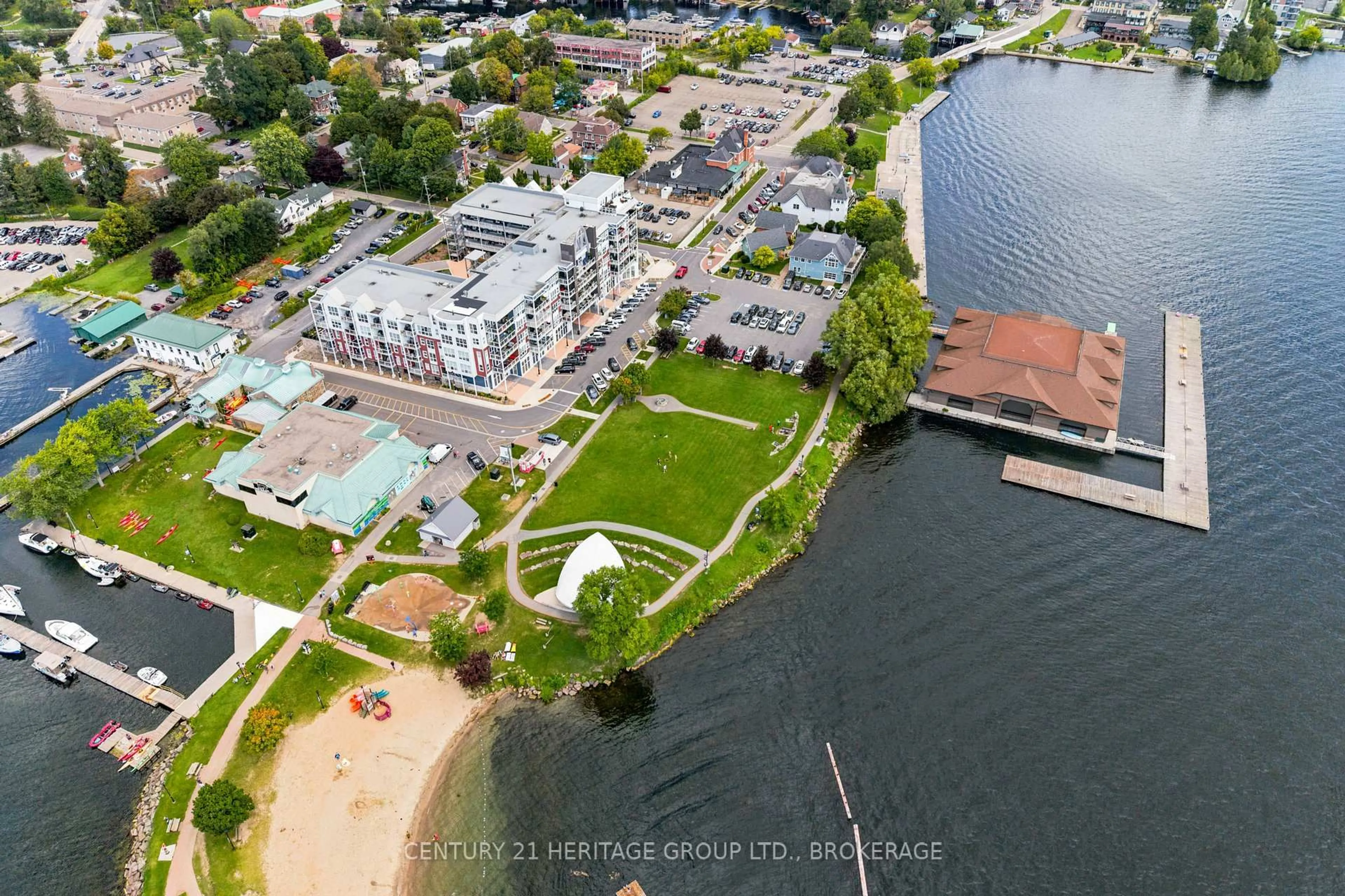 A pic from outside/outdoor area/front of a property/back of a property/a pic from drone, water/lake/river/ocean view for 130 Water St #312, Gananoque Ontario K7G 2M5