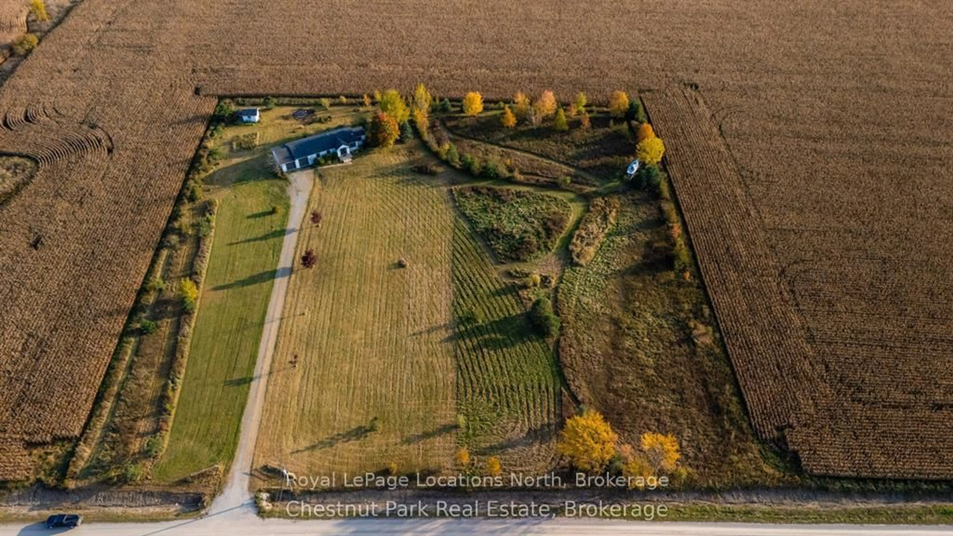 A pic from outside/outdoor area/front of a property/back of a property/a pic from drone, street for 324310 27 Sdrd, Meaford Ontario N0H 1B0