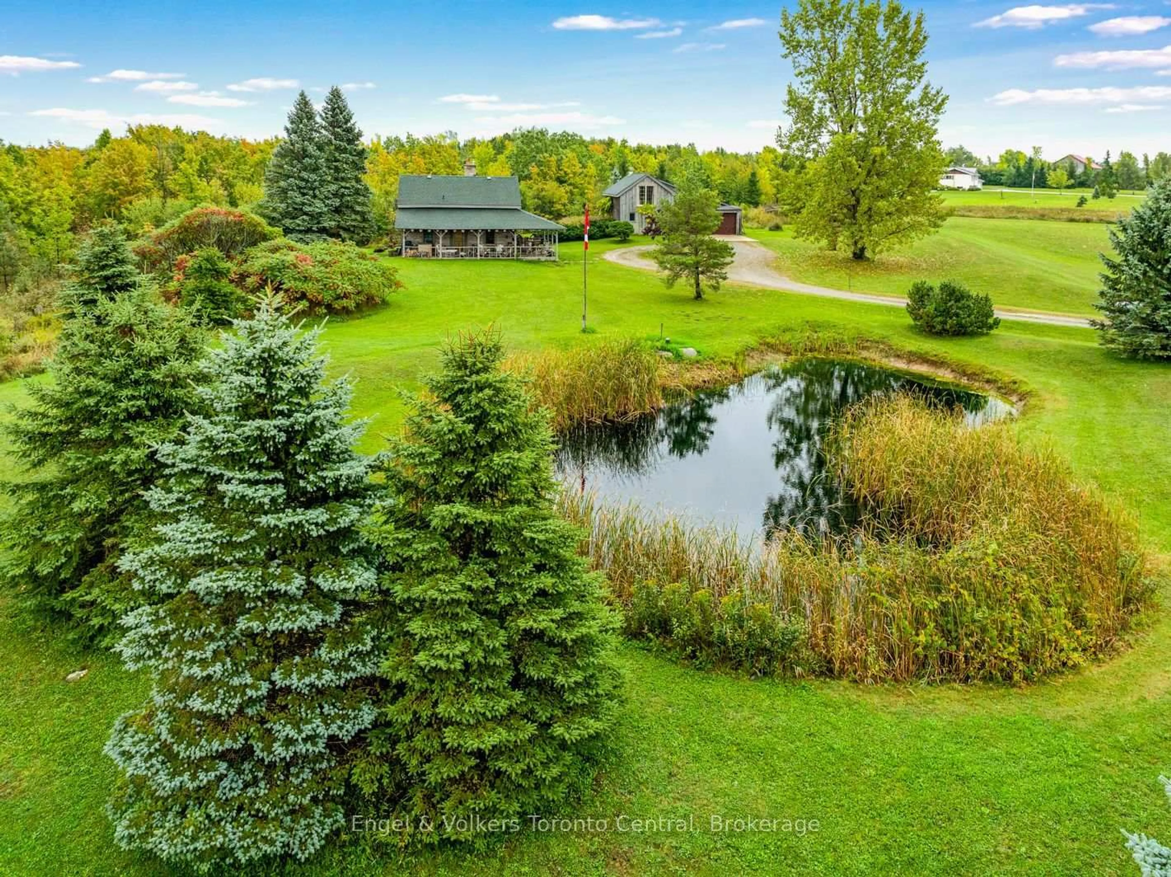 A pic from outside/outdoor area/front of a property/back of a property/a pic from drone, water/lake/river/ocean view for 317343 3rd Line, Meaford Ontario N4L 1W7