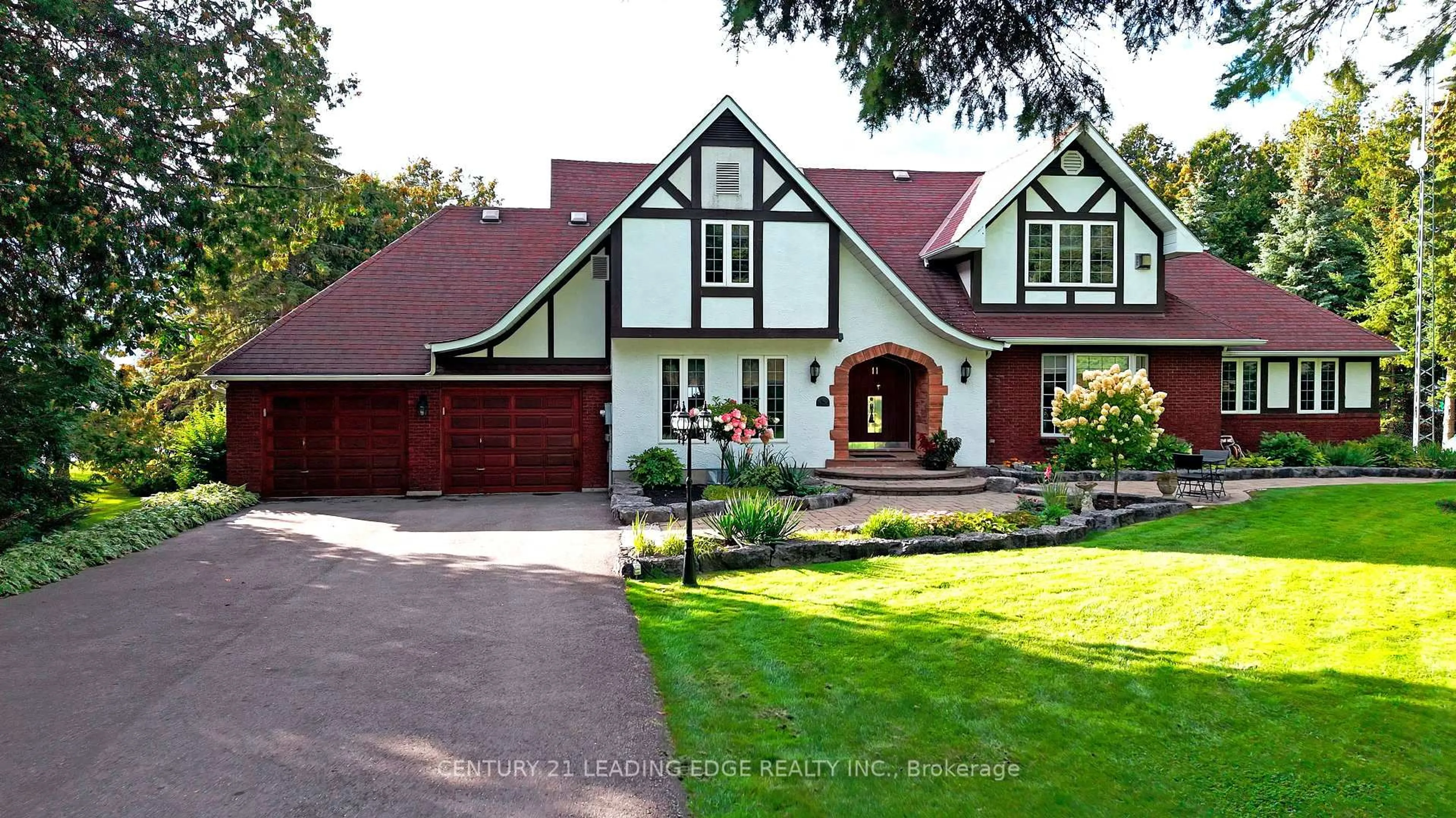 Home with brick exterior material, street for 11 Rodeo Dr, Kawartha Lakes Ontario K0M 1G0