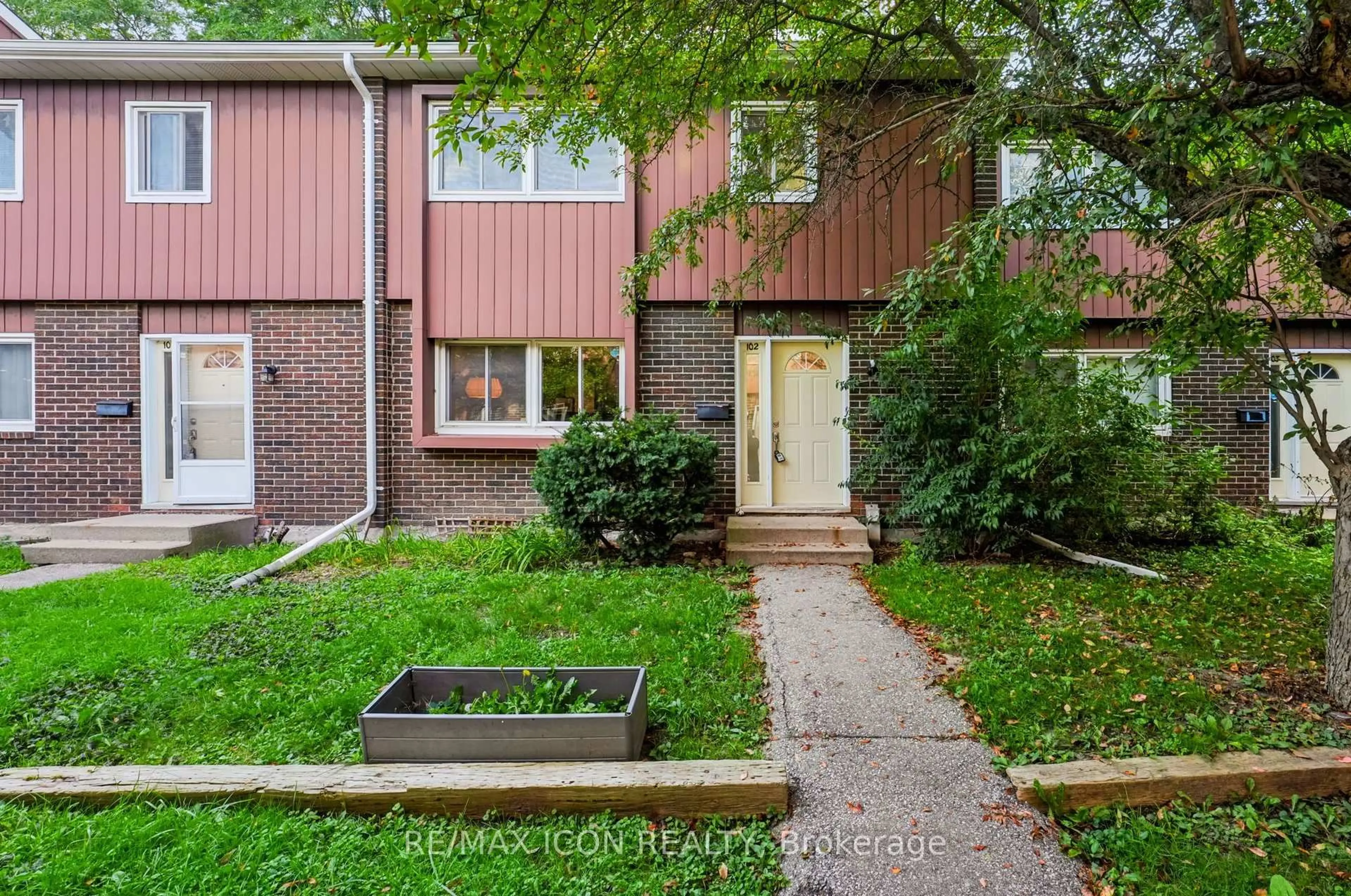 Home with brick exterior material, street for 121 University Ave #102, Waterloo Ontario N2J 4J1