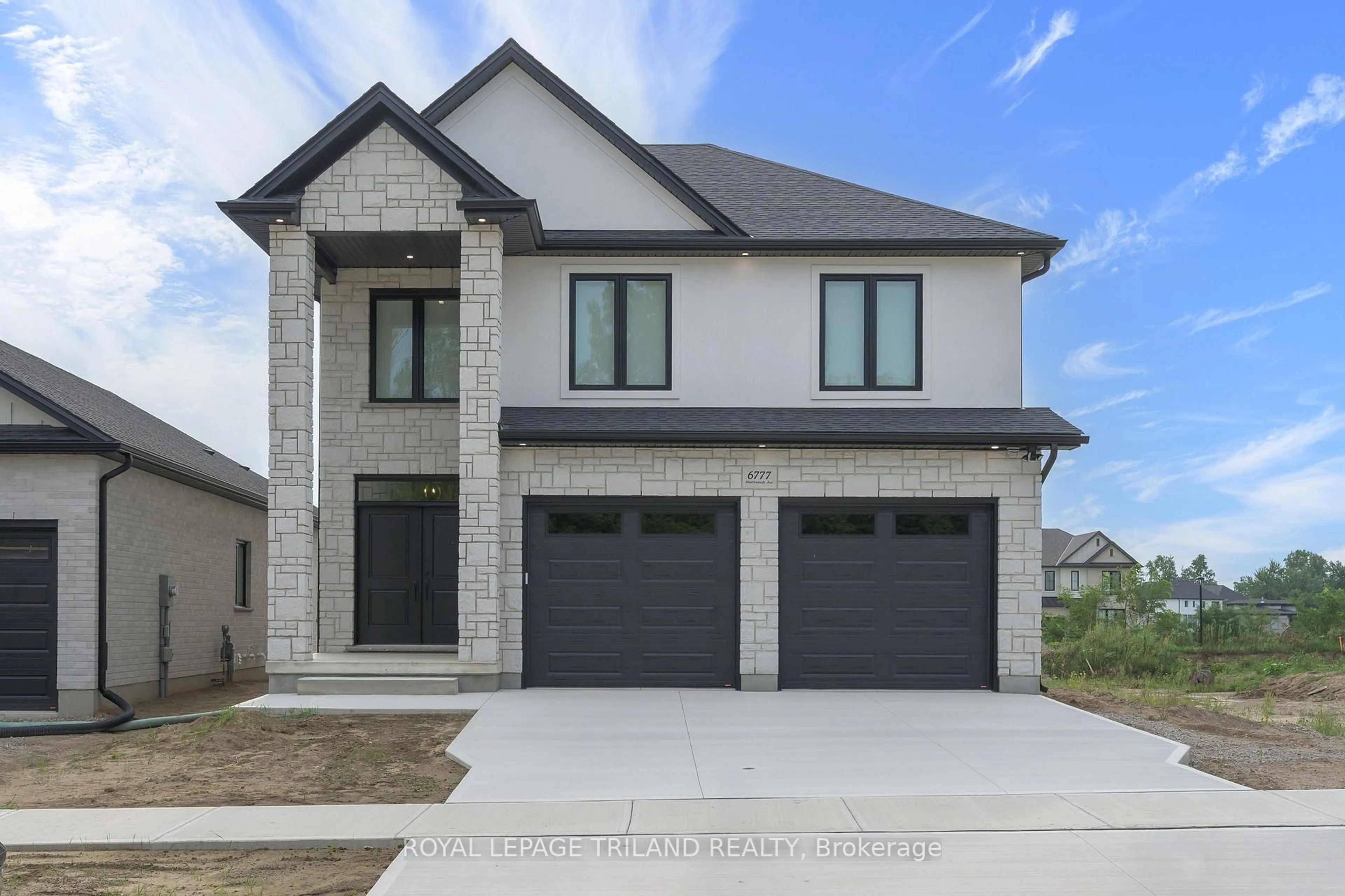 Home with brick exterior material, street for 6777 Heathwoods Ave, London South Ontario N6P 0M2
