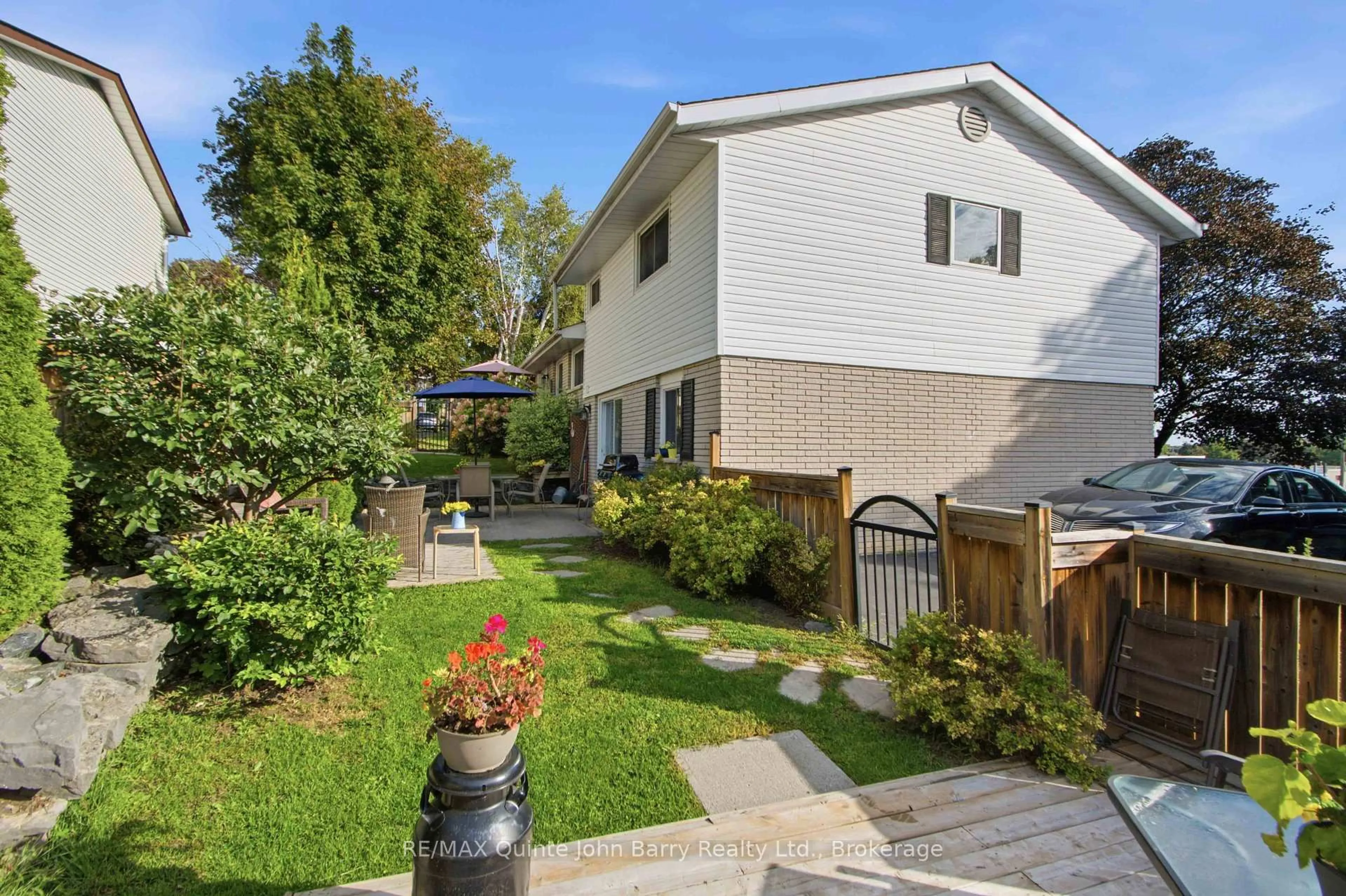 A pic from outside/outdoor area/front of a property/back of a property/a pic from drone, street for 1 Parkside Dr, Quinte West Ontario K8V 5L6