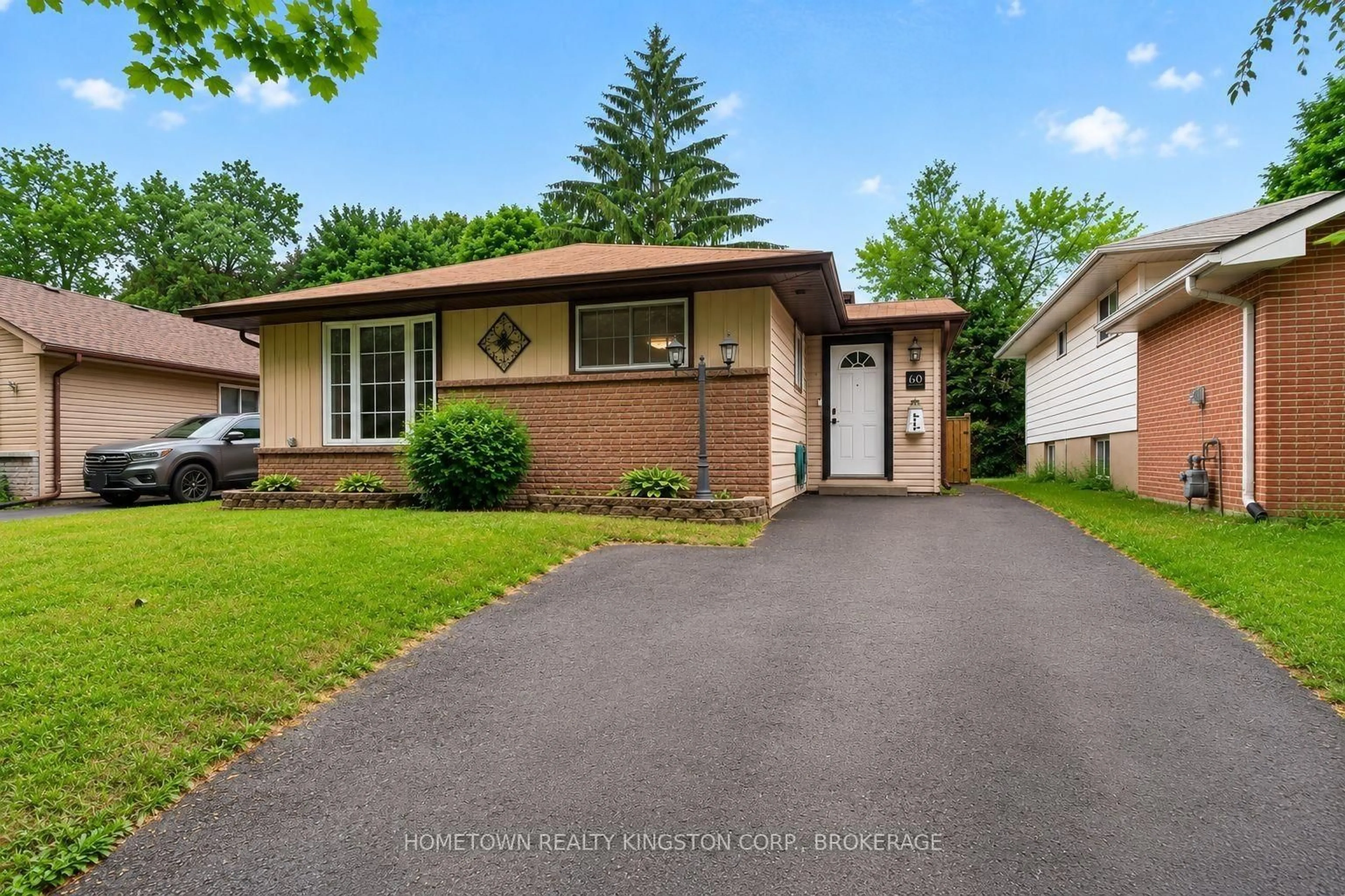 Home with vinyl exterior material, street for 60 Guthrie Dr, Kingston Ontario K7K 5X5