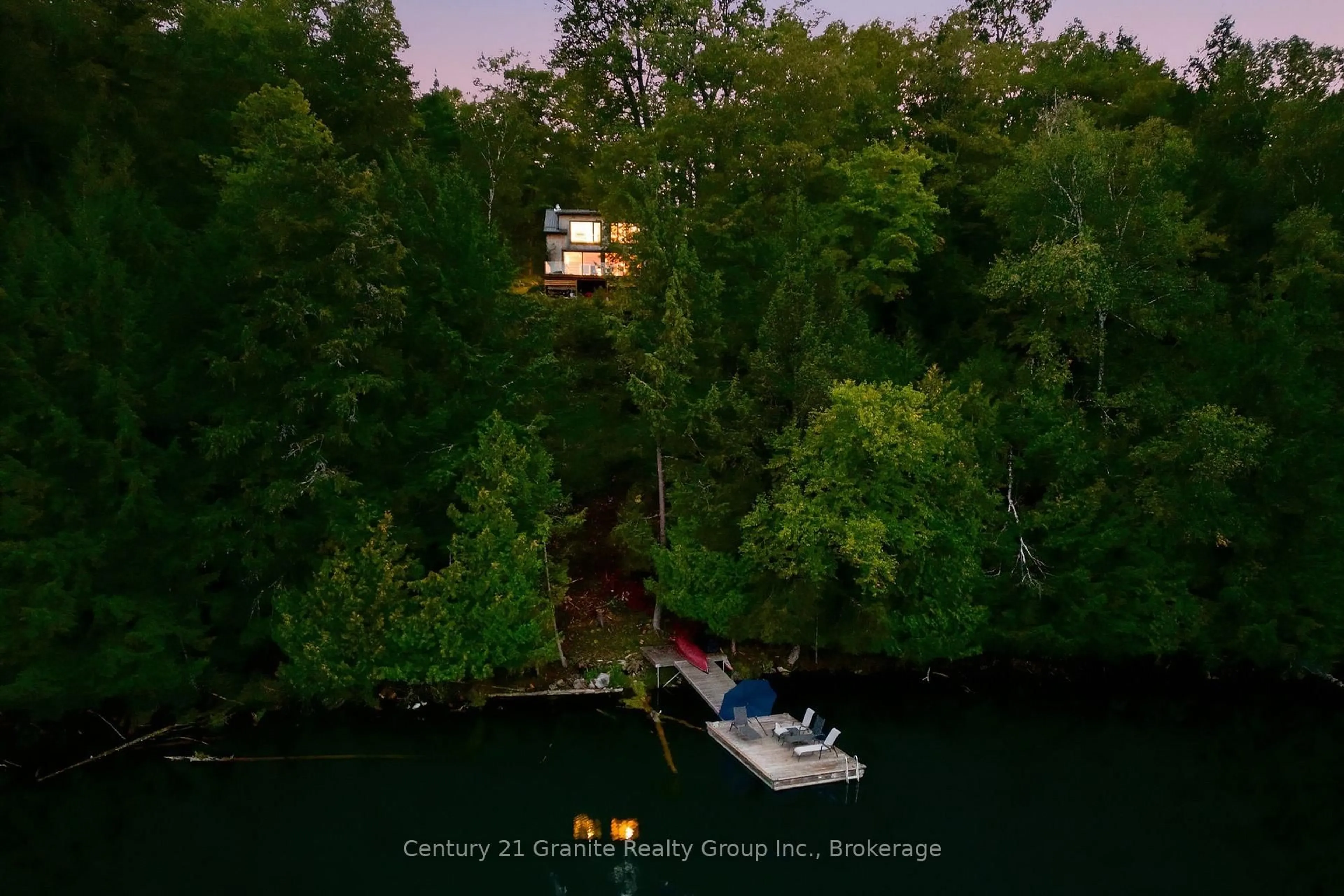 A pic from outside/outdoor area/front of a property/back of a property/a pic from drone, water/lake/river/ocean view for 1093 Liswood Rd, Dysart et al Ontario K0M 1S0