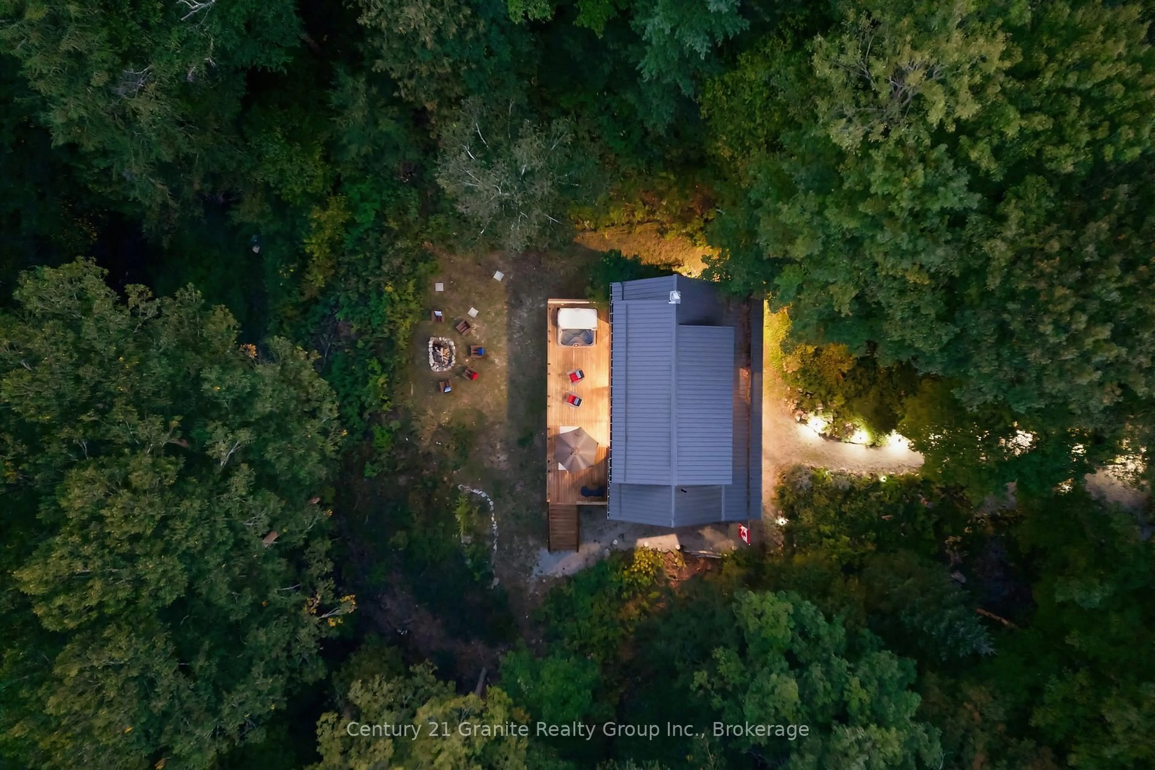 A pic from outside/outdoor area/front of a property/back of a property/a pic from drone, forest/trees view for 1093 Liswood Rd, Dysart et al Ontario K0M 1S0
