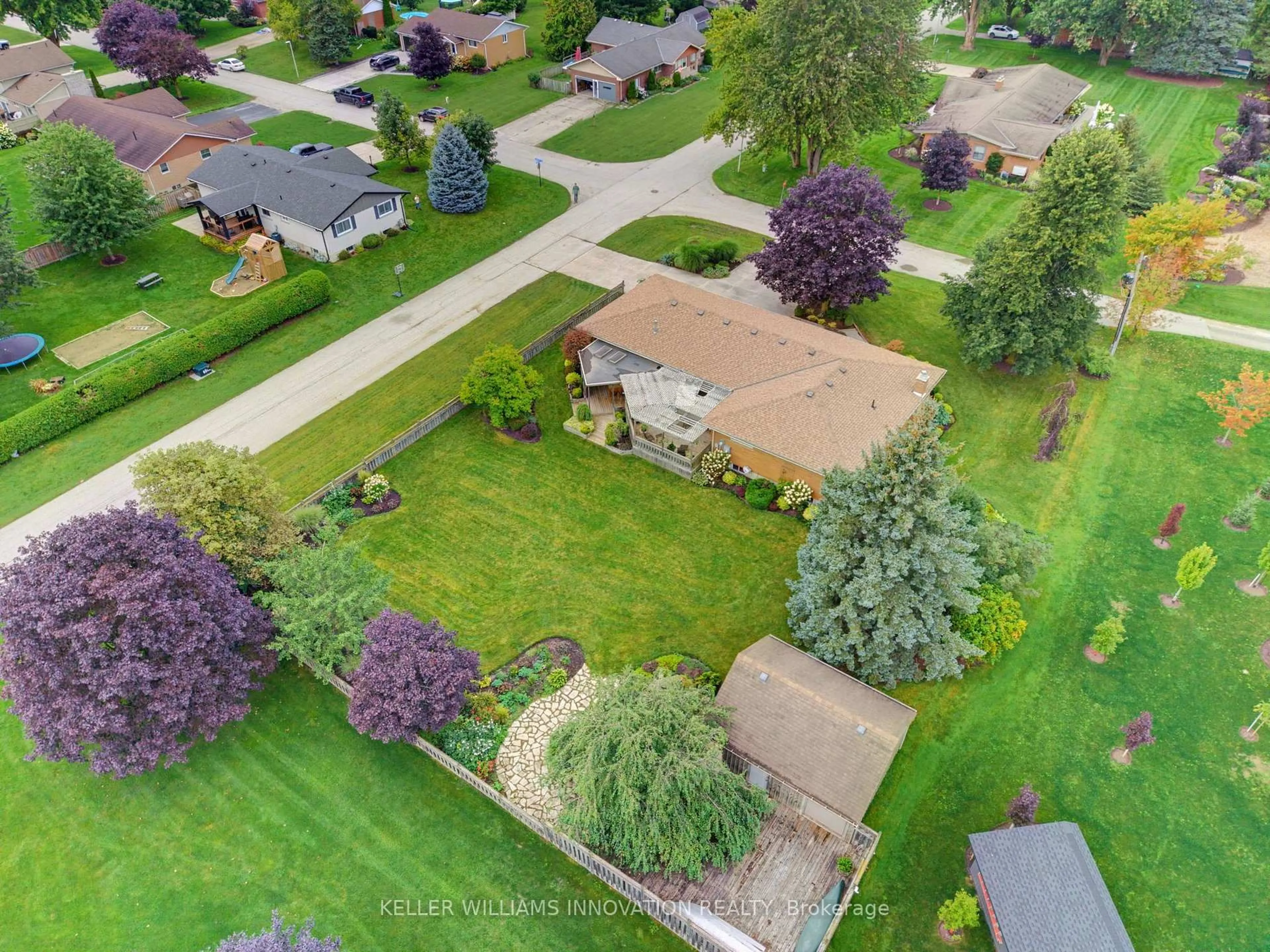 A pic from outside/outdoor area/front of a property/back of a property/a pic from drone, street for 298 Woodview Dr, North Perth Ontario N0G 1B0