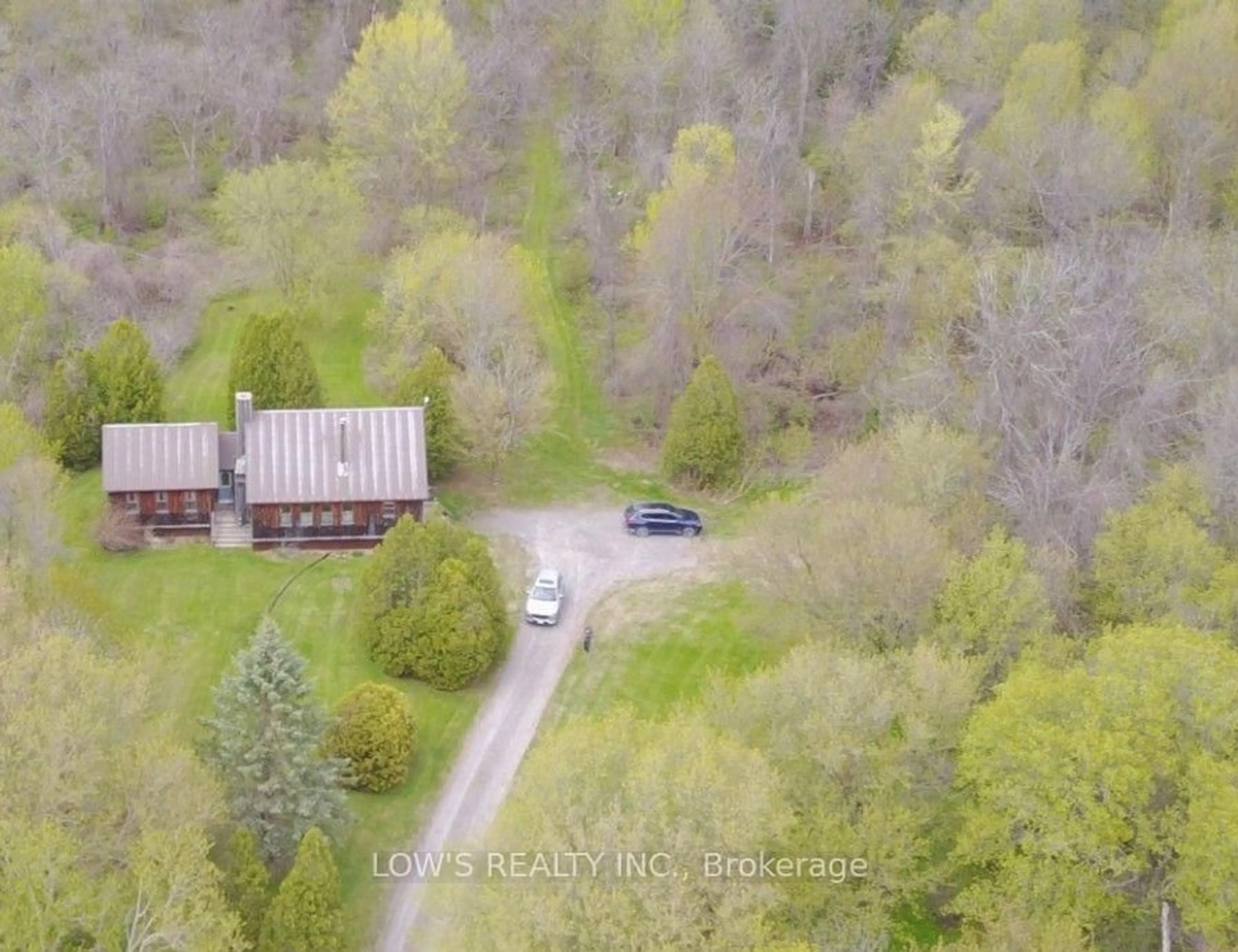 A pic from outside/outdoor area/front of a property/back of a property/a pic from drone, forest/trees view for 21325 Creek Rd, North Glengarry Ontario K0B 1E0