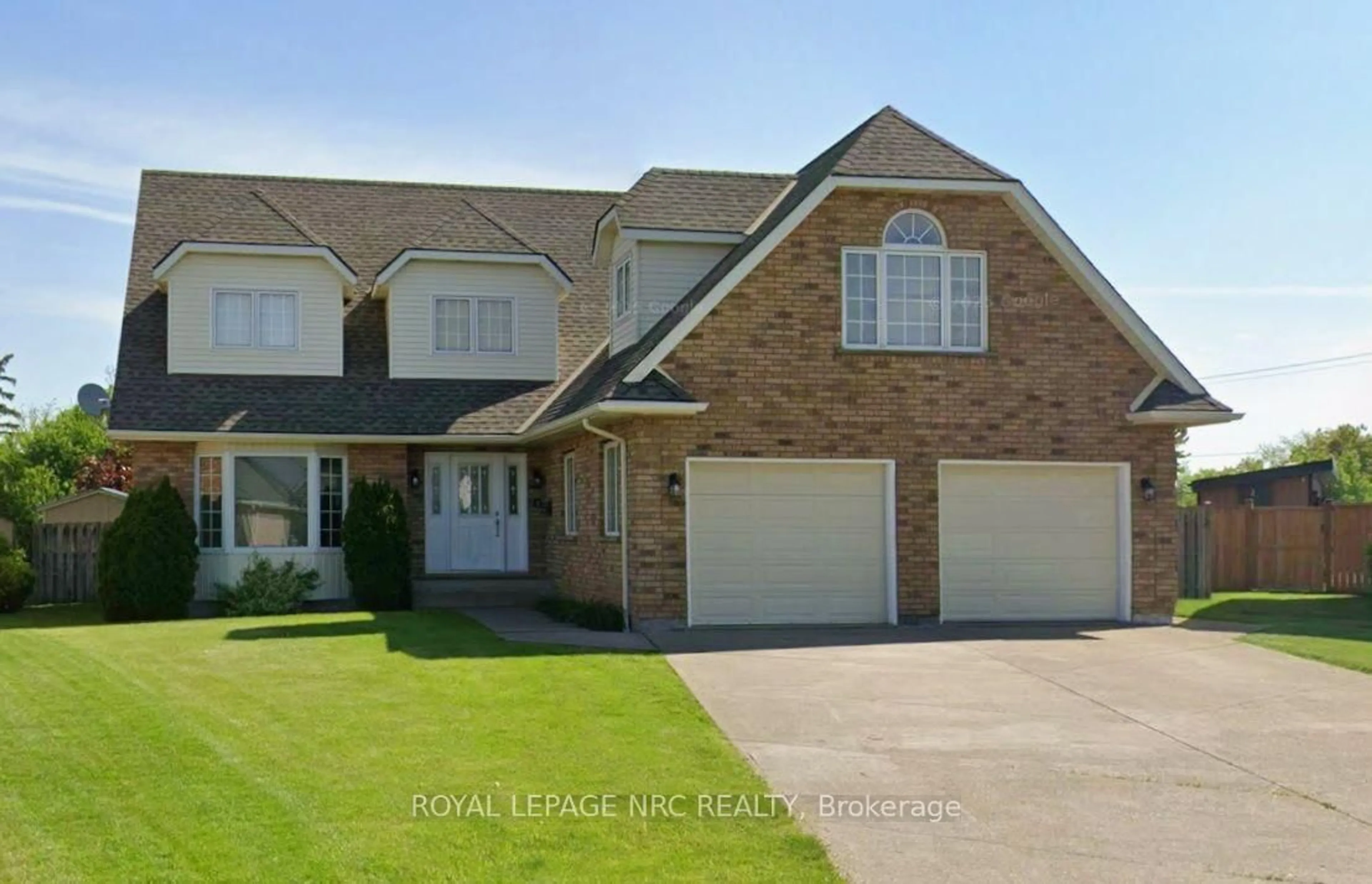 Home with brick exterior material, street for 21 Elmvale Cres, Port Colborne Ontario L3K 5Z9