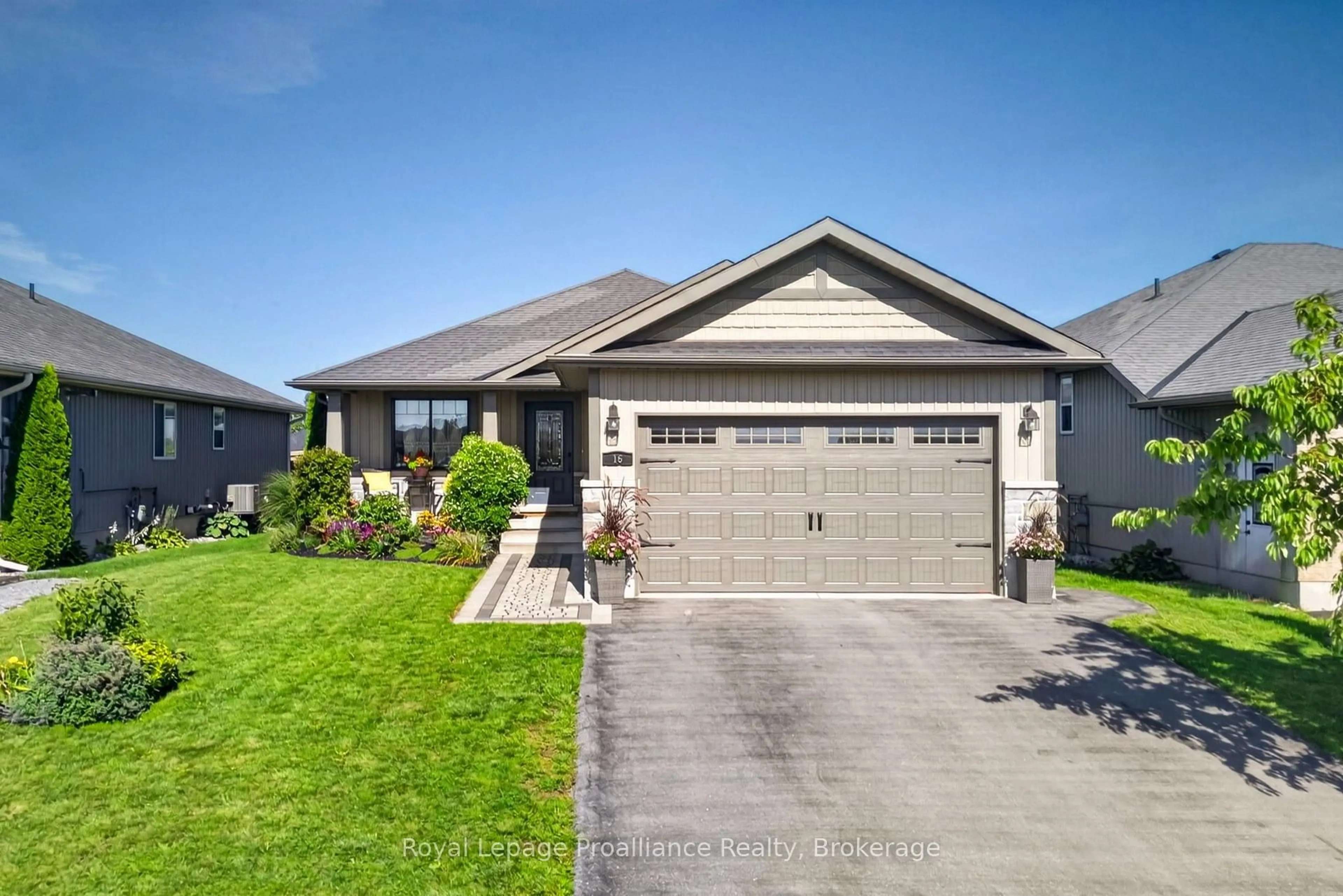 Home with vinyl exterior material, street for 16 Butternut Crt, Belleville Ontario K8P 0C5
