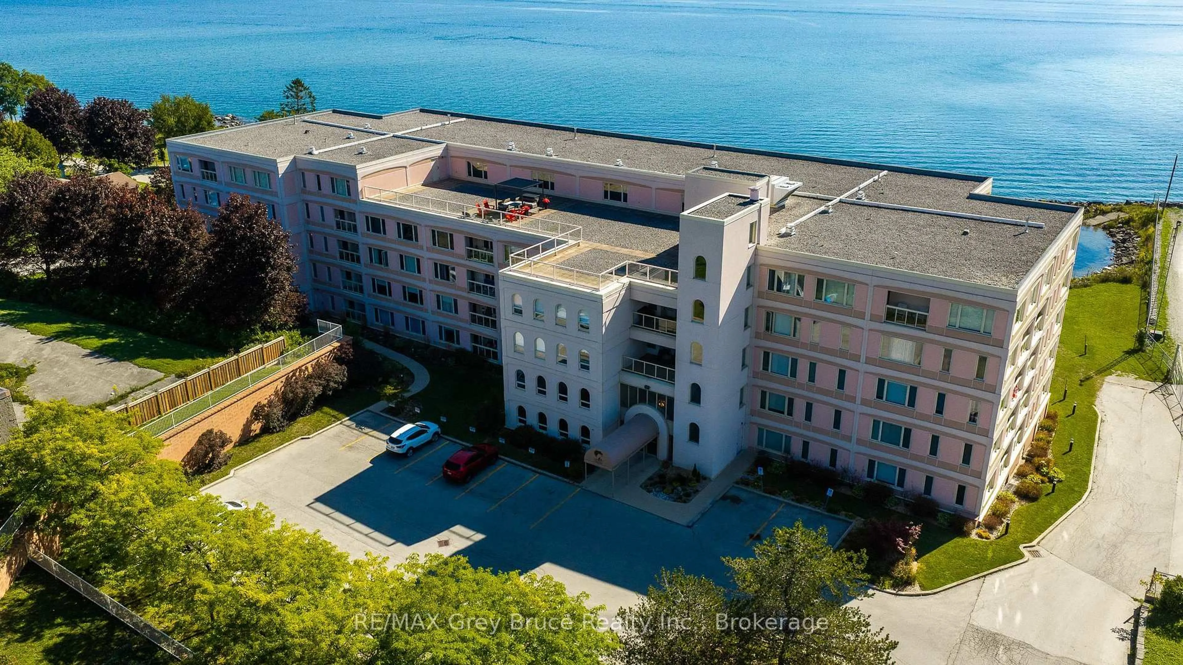 A pic from outside/outdoor area/front of a property/back of a property/a pic from drone, water/lake/river/ocean view for 2555 3rd Ave #310, Owen Sound Ontario N4K 6T8