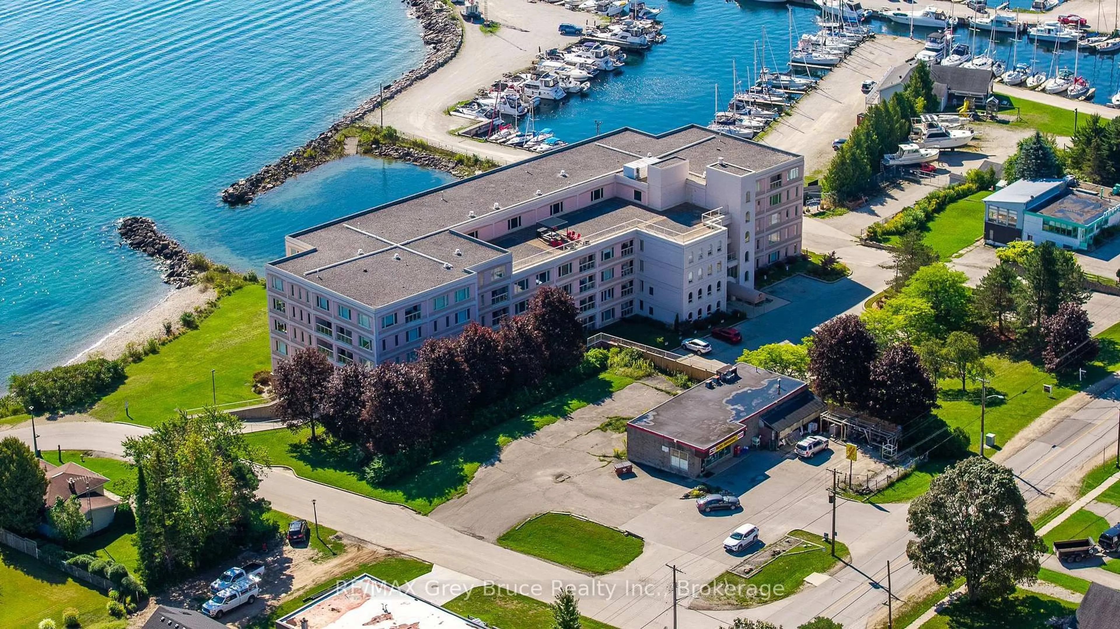A pic from outside/outdoor area/front of a property/back of a property/a pic from drone, water/lake/river/ocean view for 2555 3rd Ave #310, Owen Sound Ontario N4K 6T8