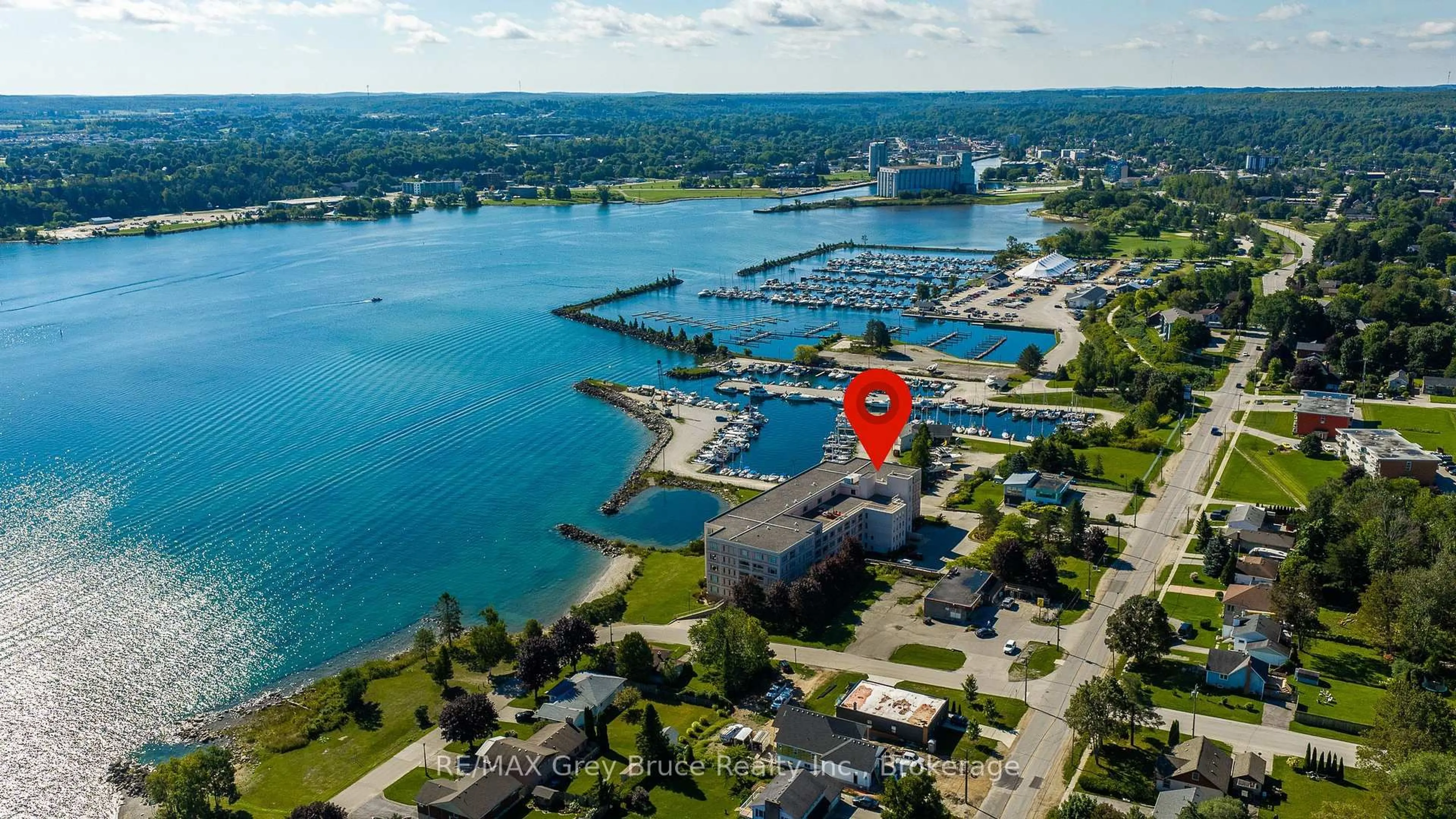 A pic from outside/outdoor area/front of a property/back of a property/a pic from drone, water/lake/river/ocean view for 2555 3rd Ave #310, Owen Sound Ontario N4K 6T8