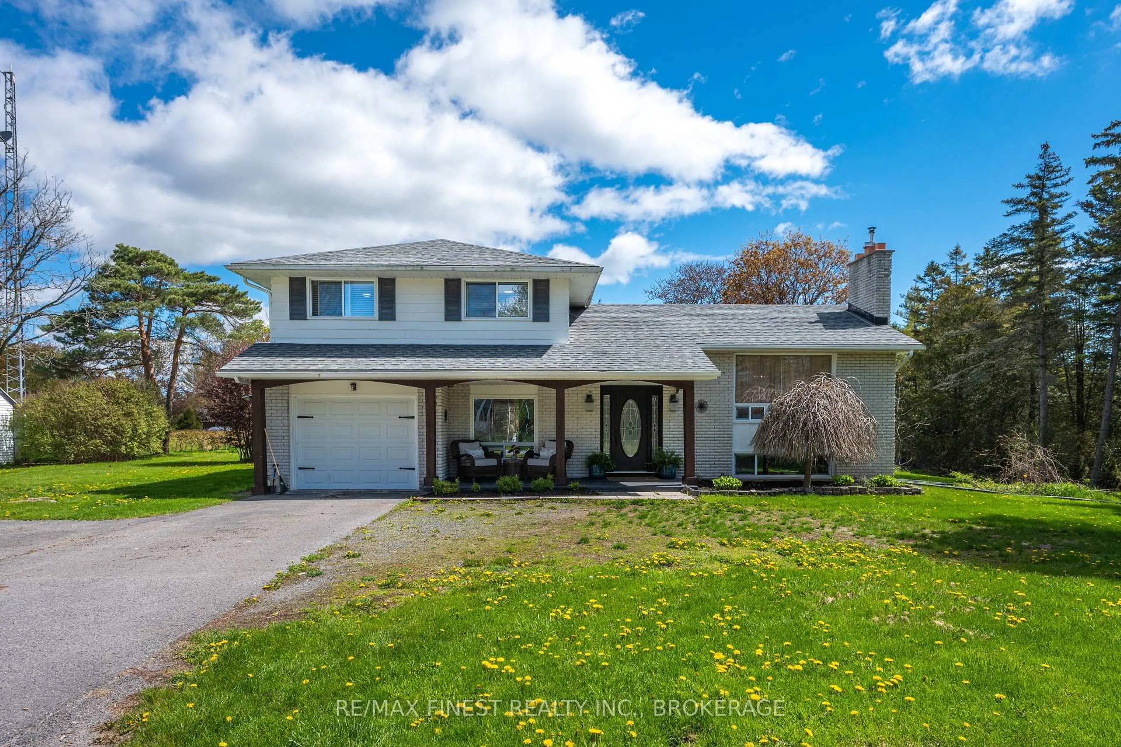 Home with vinyl exterior material, street for 207 Meadow Cres, Bath Ontario K0H 1G0
