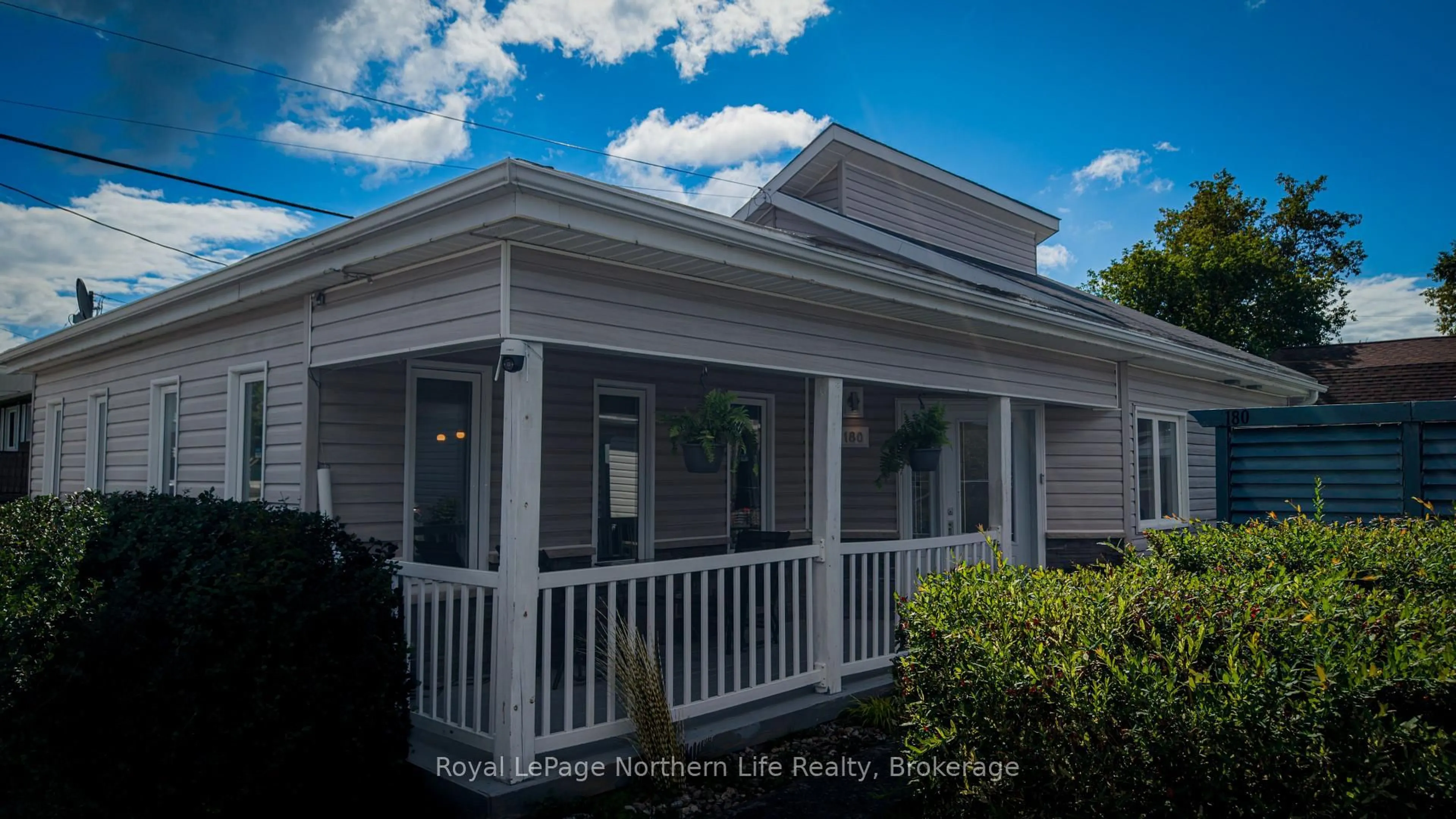 Home with vinyl exterior material, street for 180 Queen St, West Nipissing Ontario P2B 2G5