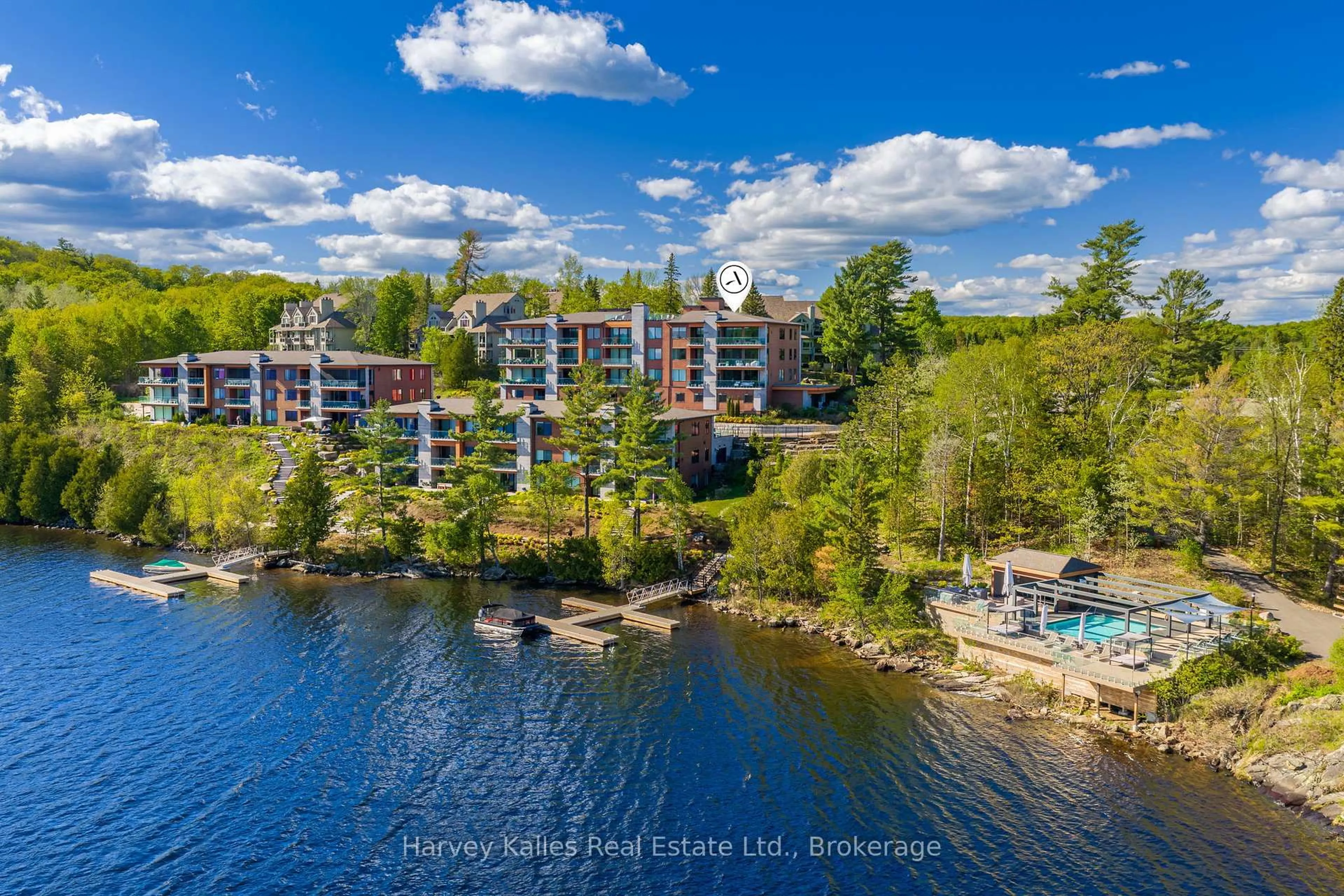 A pic from outside/outdoor area/front of a property/back of a property/a pic from drone, water/lake/river/ocean view for 727 Grandview Dr #211, Huntsville Ontario P1H 1B2