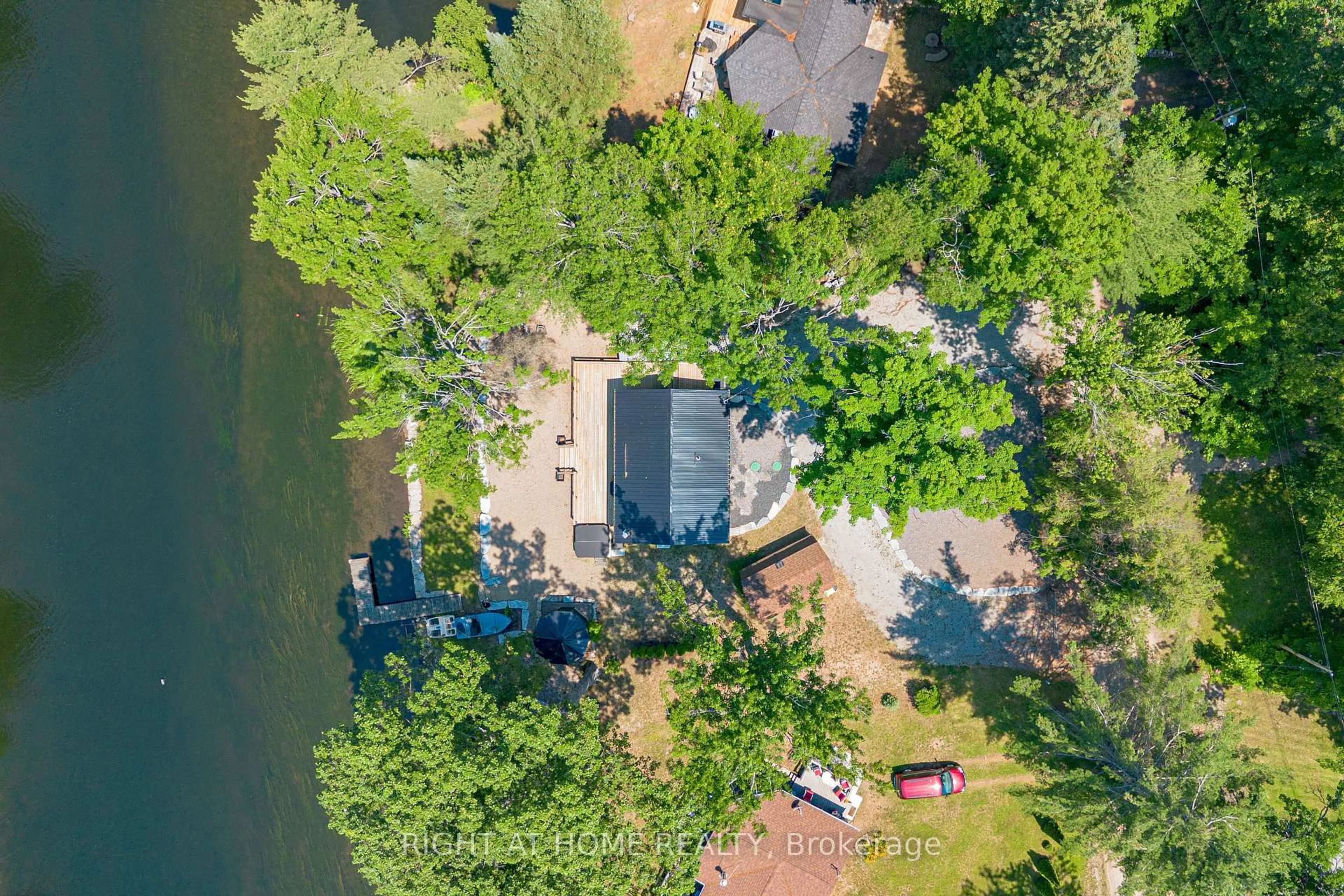 A pic from outside/outdoor area/front of a property/back of a property/a pic from drone, water/lake/river/ocean view for 11 Little Bay Dr, Kawartha Lakes Ontario K0M 2L0