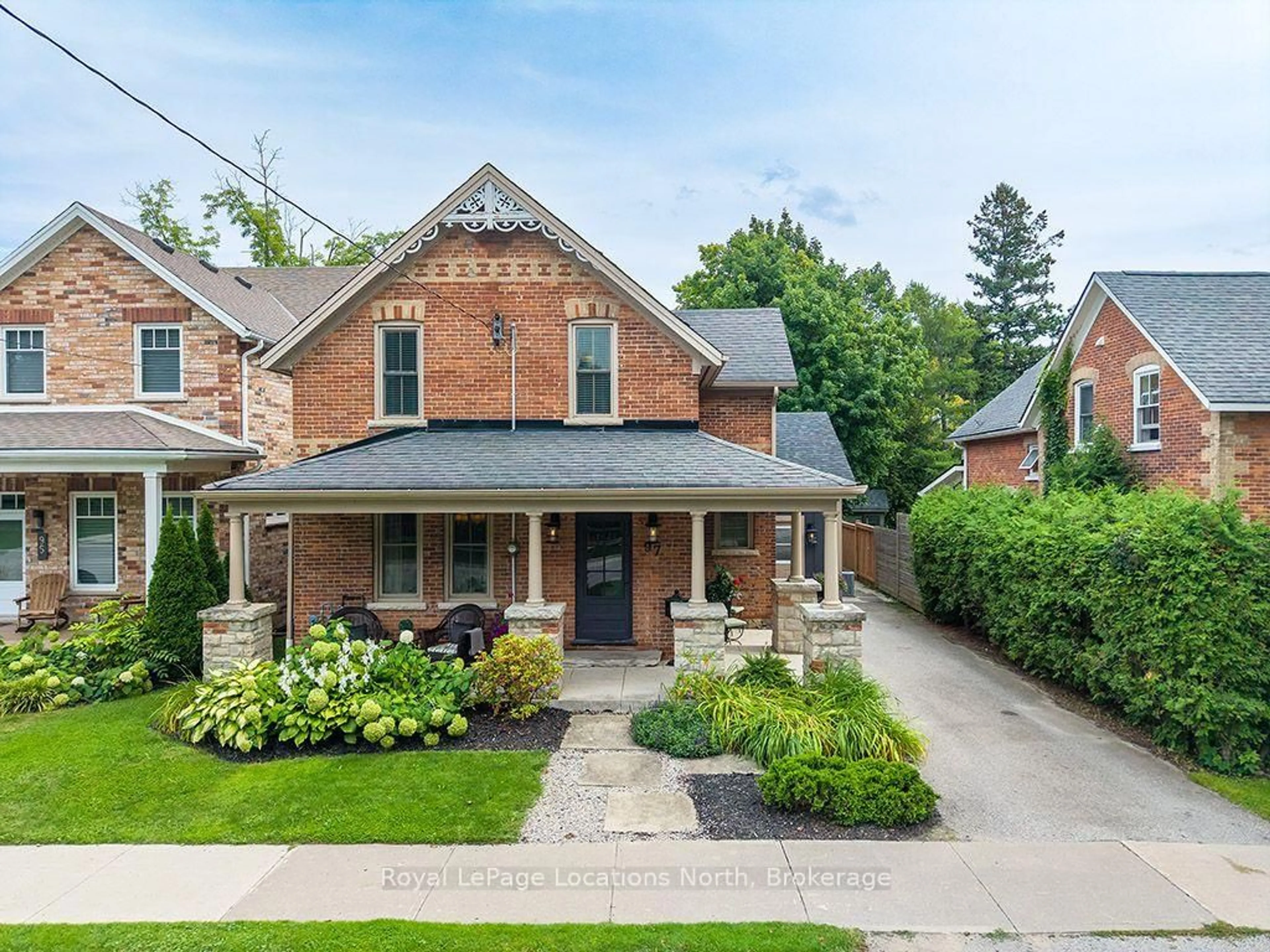 Home with brick exterior material, street for 97 Bruce St, Blue Mountains Ontario N0H 2P0