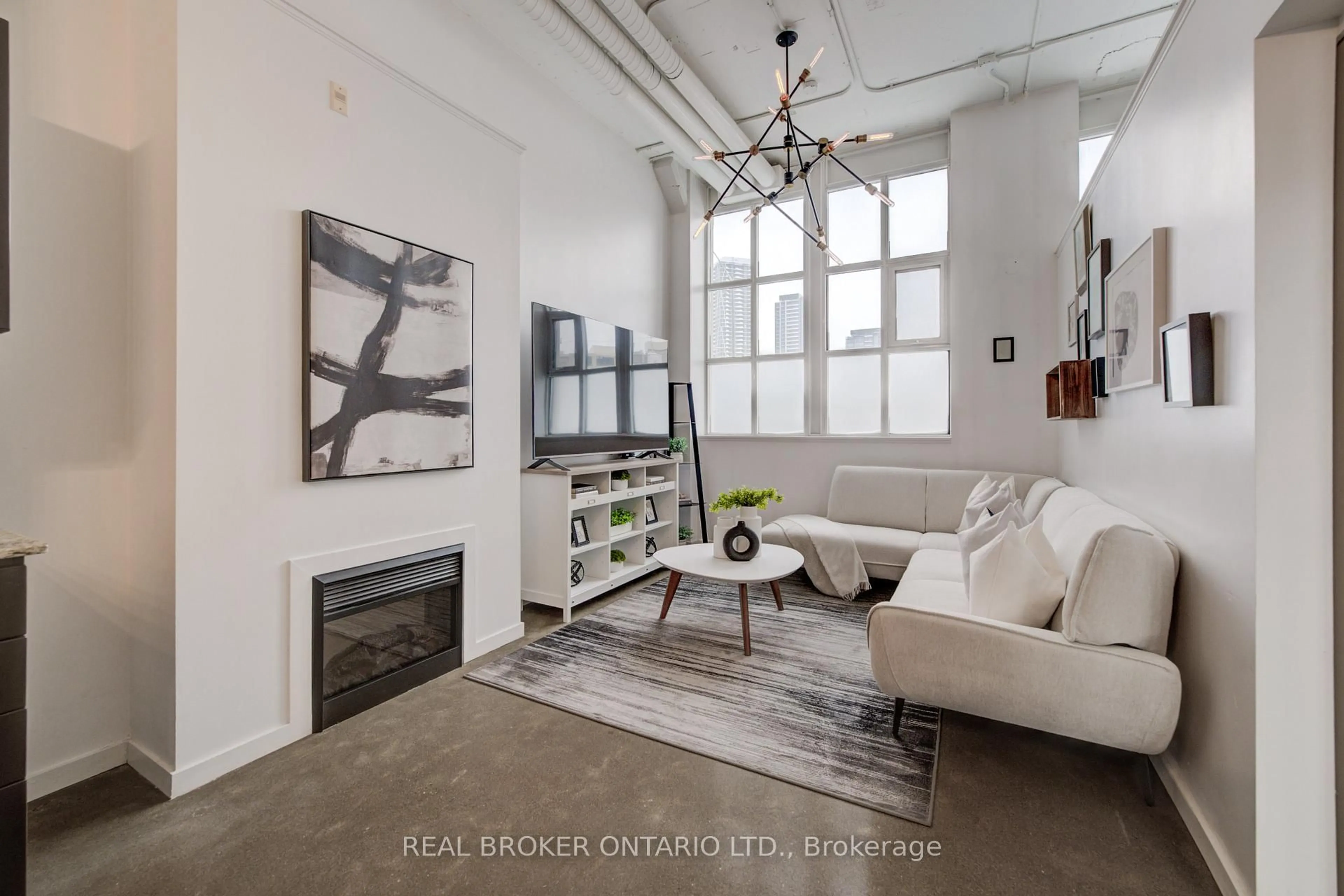 Living room with furniture, cement floor for 410 King St #126, Kitchener Ontario N2G 1C3