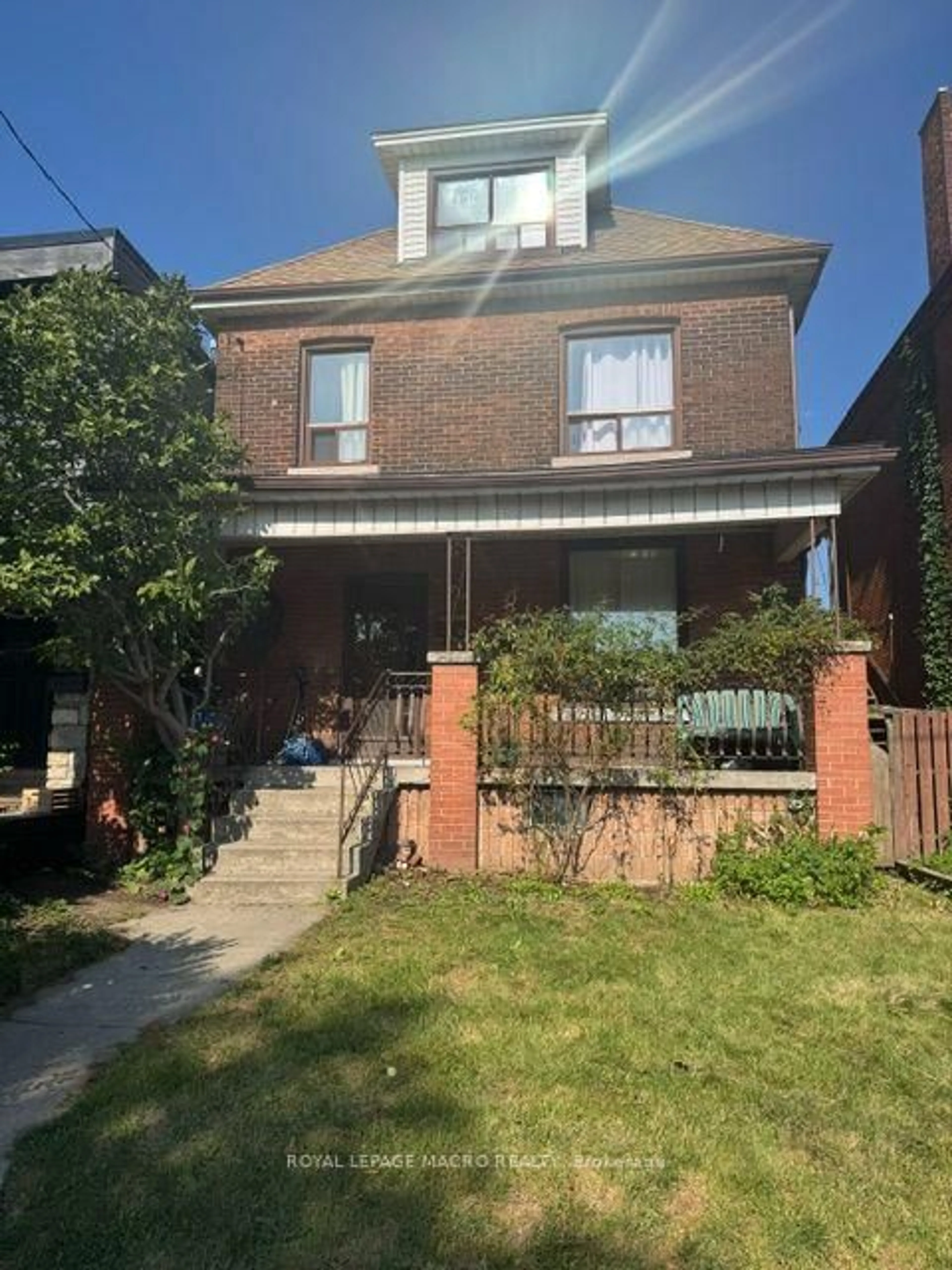 Home with brick exterior material, street for 143 Elgin St, Hamilton Ontario L8L 4Y1