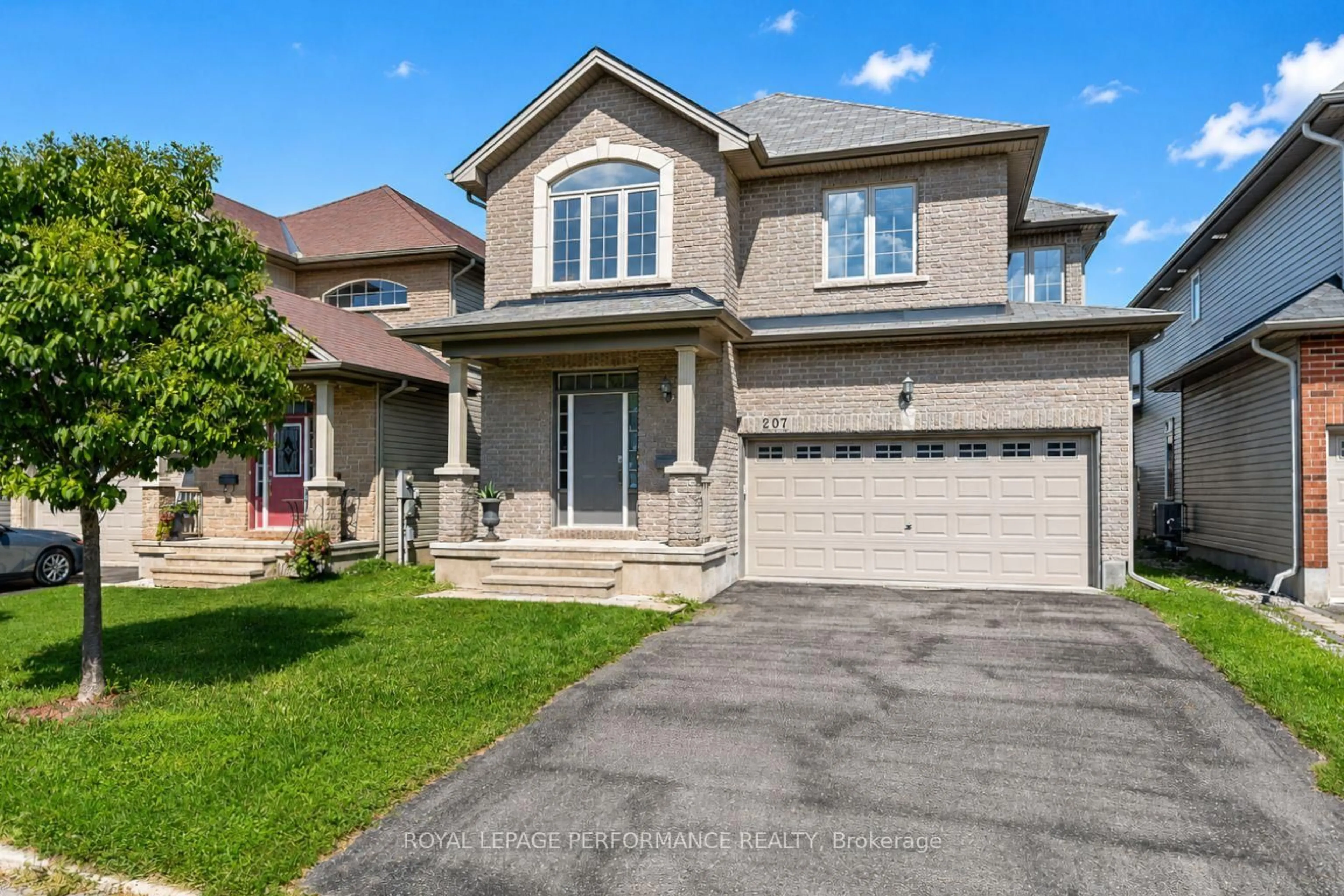 Home with brick exterior material, street for 207 Dave Smith Cres, Ottawa Ontario K4M 0B7