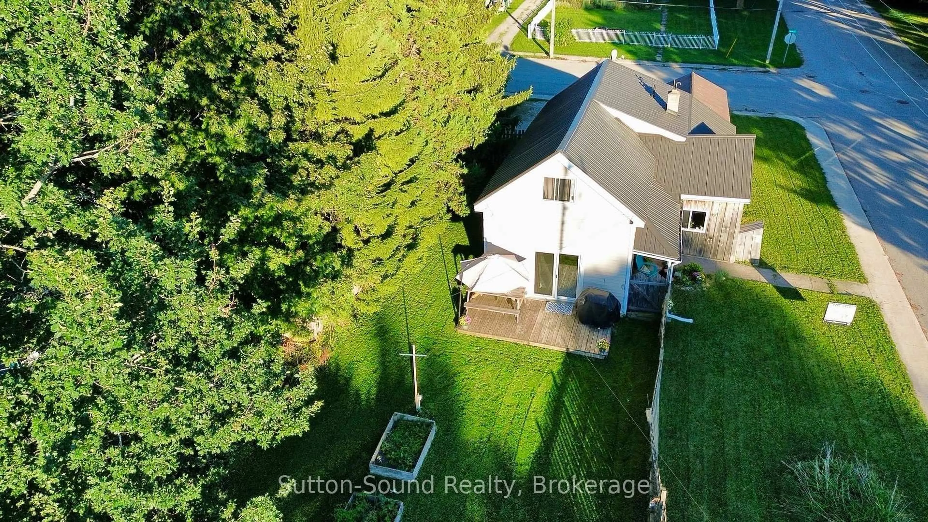A pic from outside/outdoor area/front of a property/back of a property/a pic from drone, street for 34 Main St, Arran-Elderslie Ontario N0H 2N0