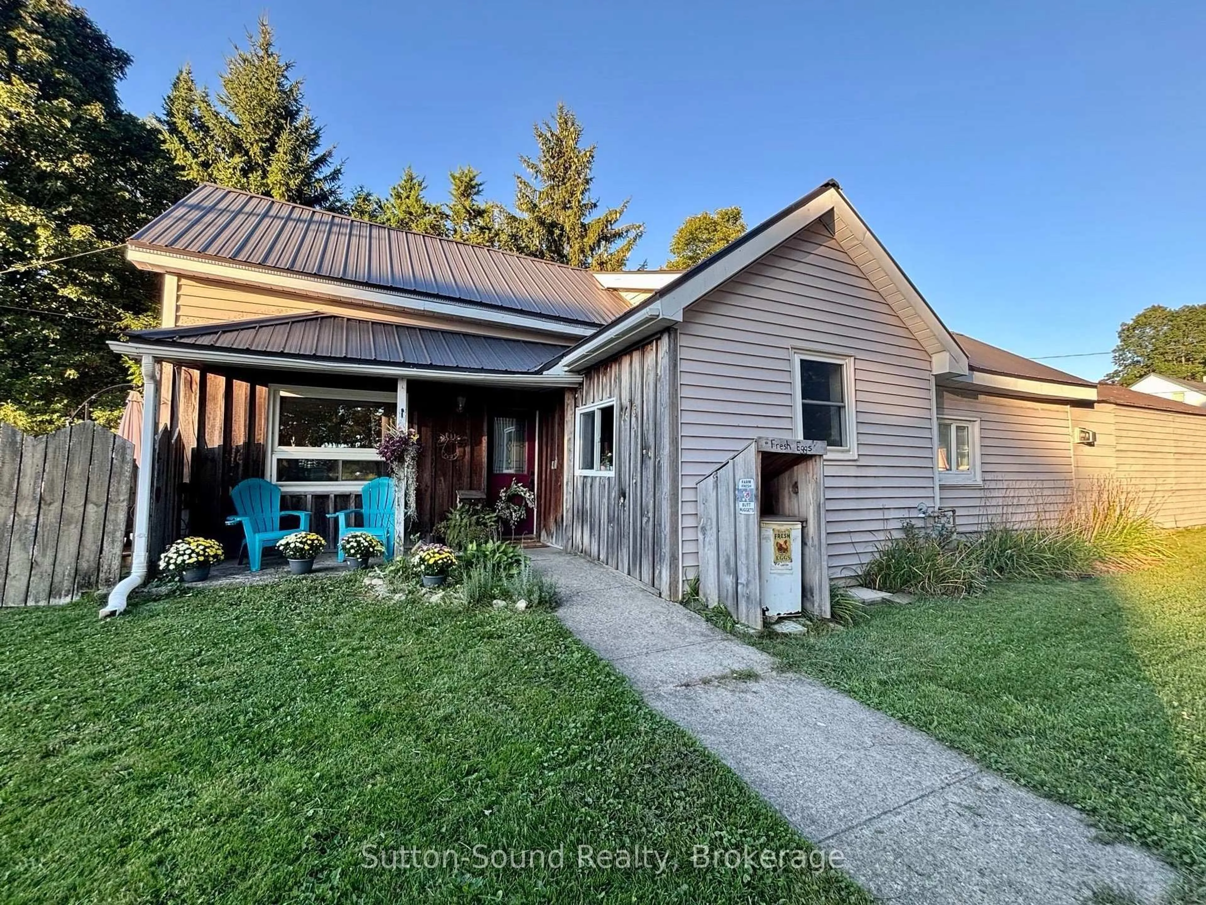 A pic from outside/outdoor area/front of a property/back of a property/a pic from drone, unknown for 34 Main St, Arran-Elderslie Ontario N0H 2N0
