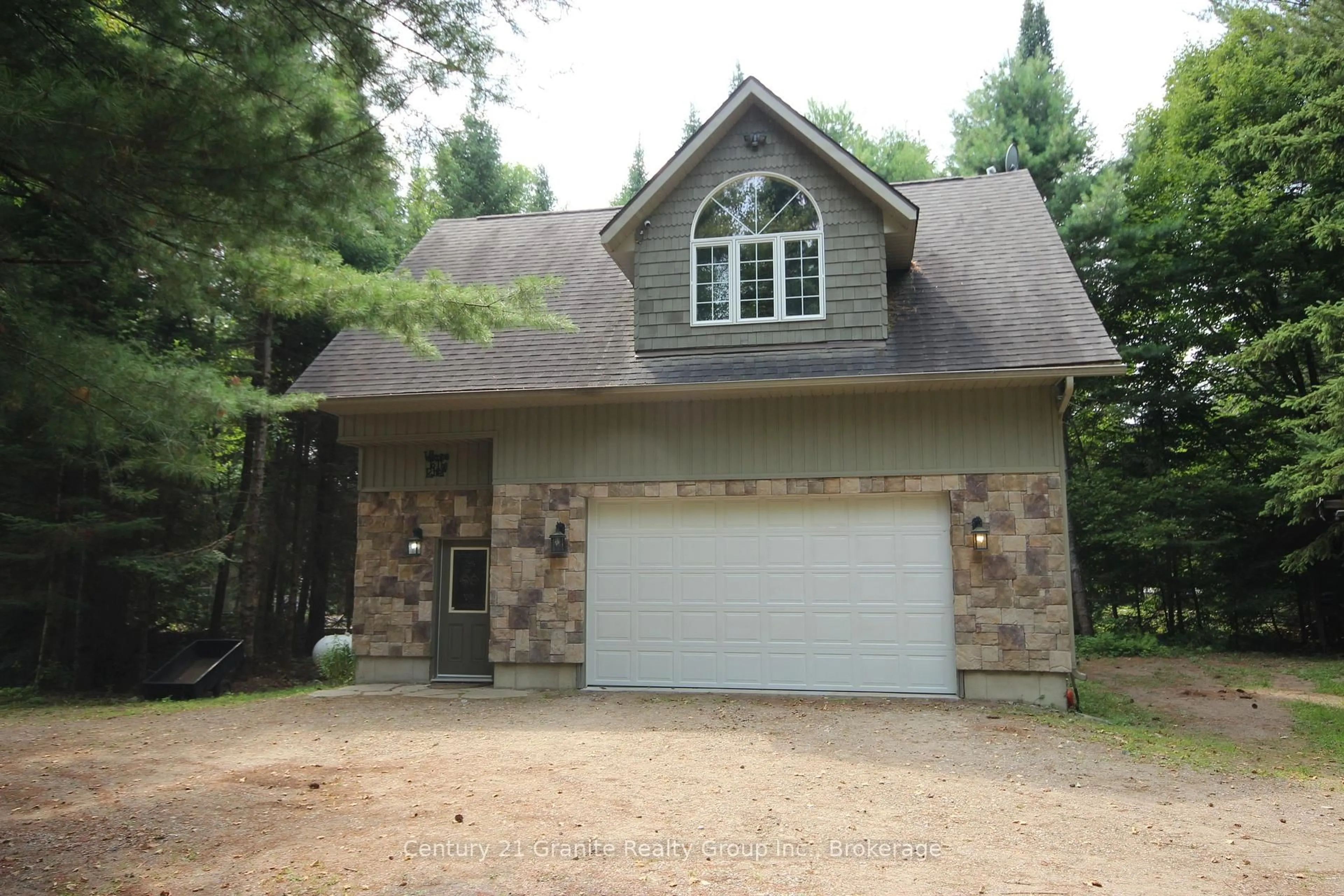 Home with brick exterior material, street for 1082 Green Lake Rd, Algonquin Highlands Ontario K0M 1S0