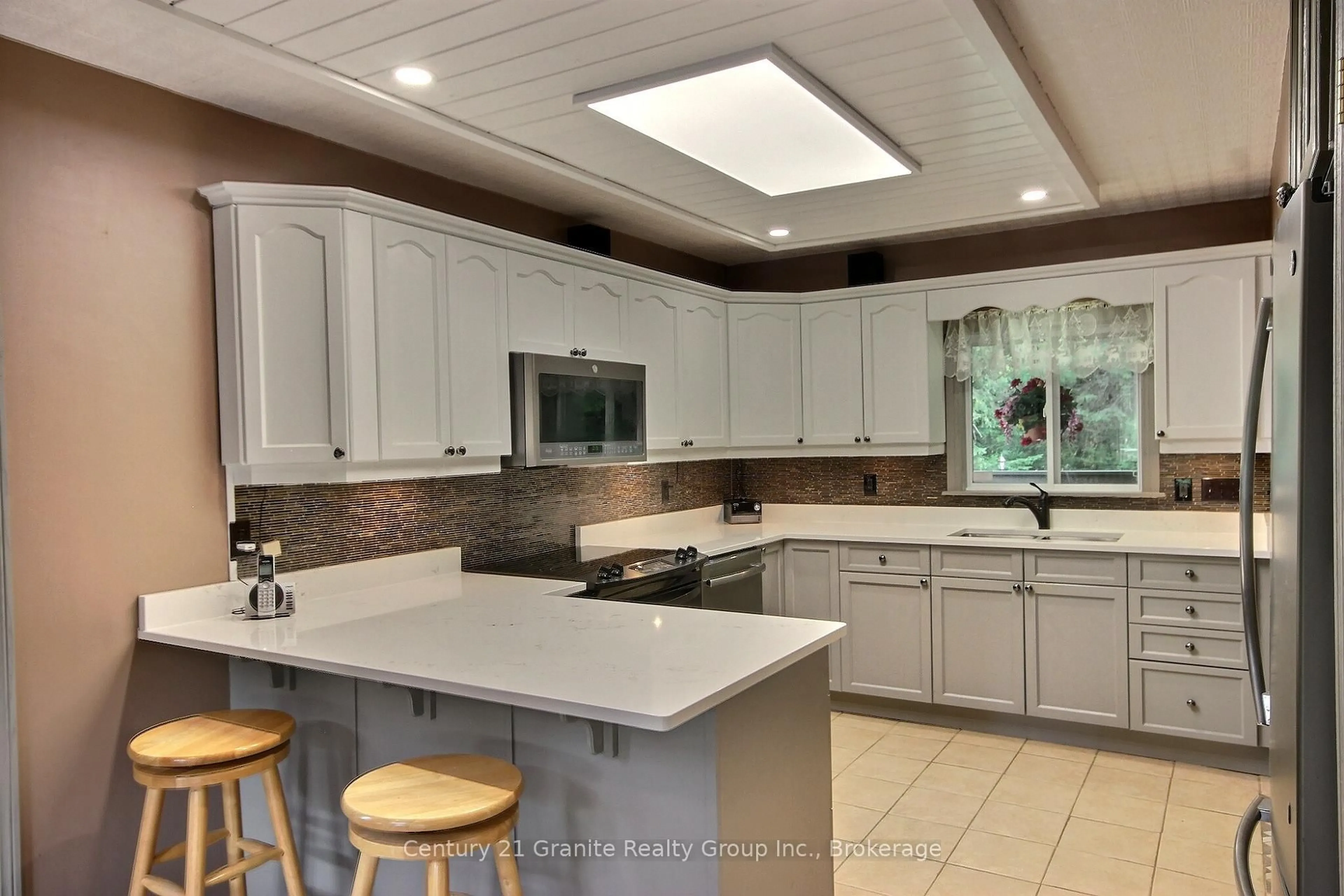 Open concept kitchen, ceramic/tile floor for 1082 Green Lake Rd, Algonquin Highlands Ontario K0M 1S0