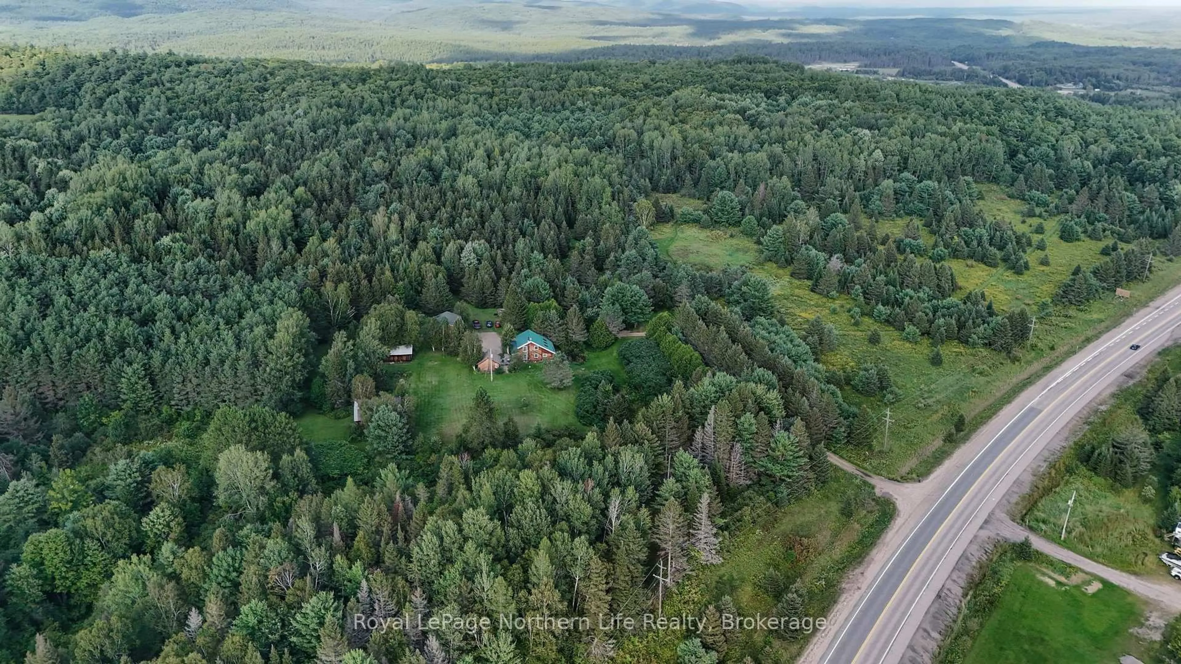A pic from outside/outdoor area/front of a property/back of a property/a pic from drone, forest/trees view for 9609 Highway 17, Calvin Ontario P0H 1H0