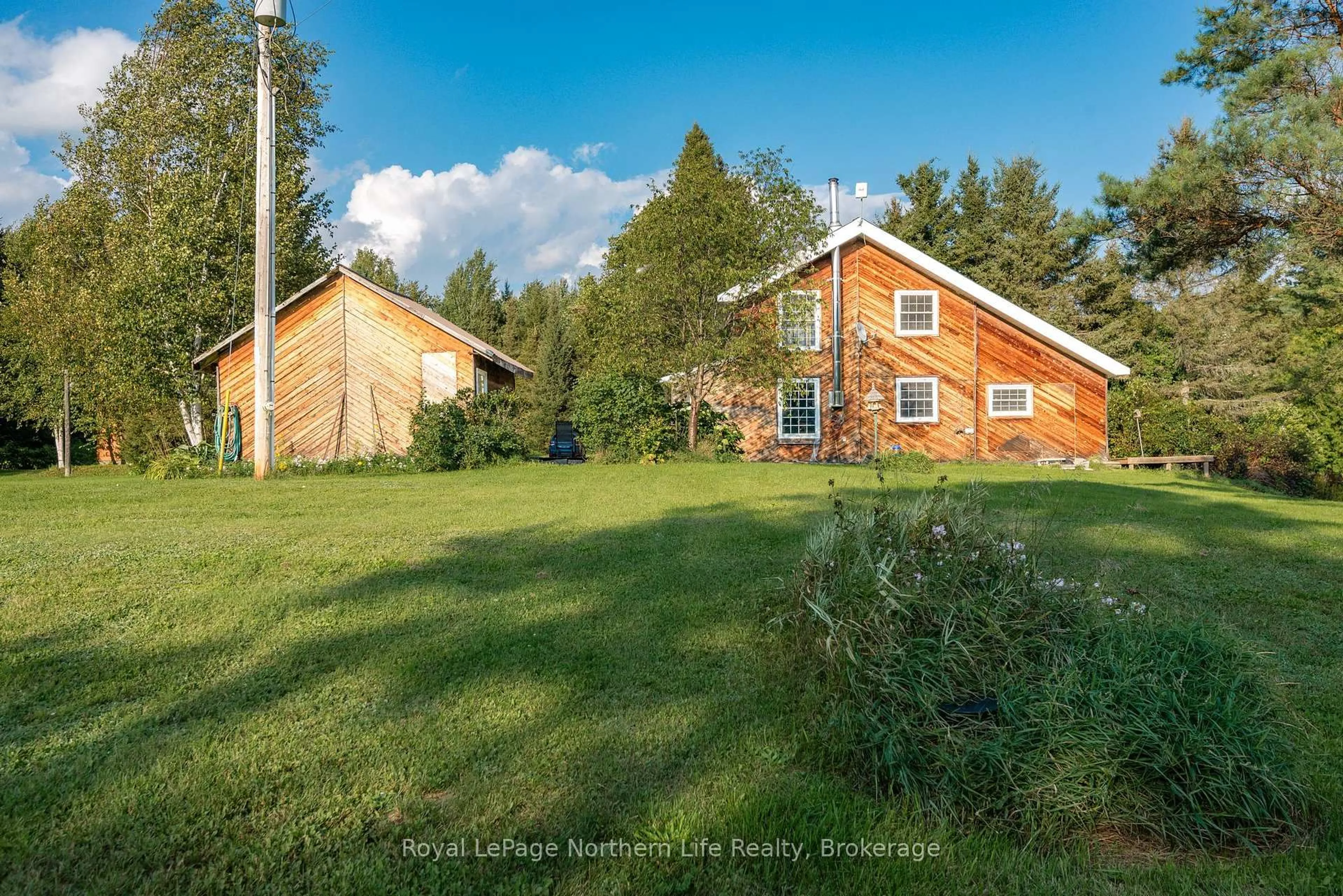 A pic from outside/outdoor area/front of a property/back of a property/a pic from drone, unknown for 9609 Highway 17, Calvin Ontario P0H 1H0