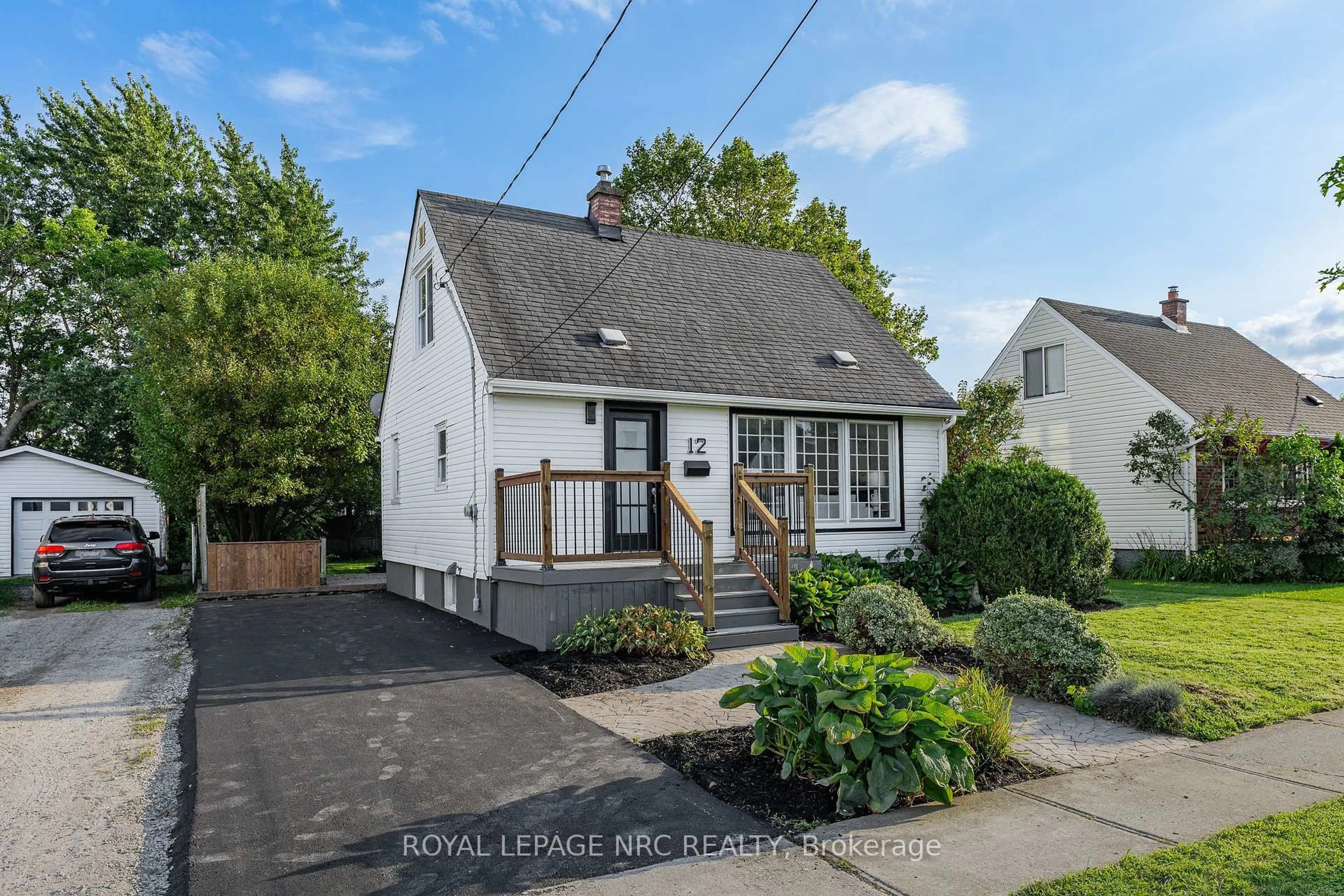 Home with vinyl exterior material, street for 12 Admiral Rd, St. Catharines Ontario L2P 1G5