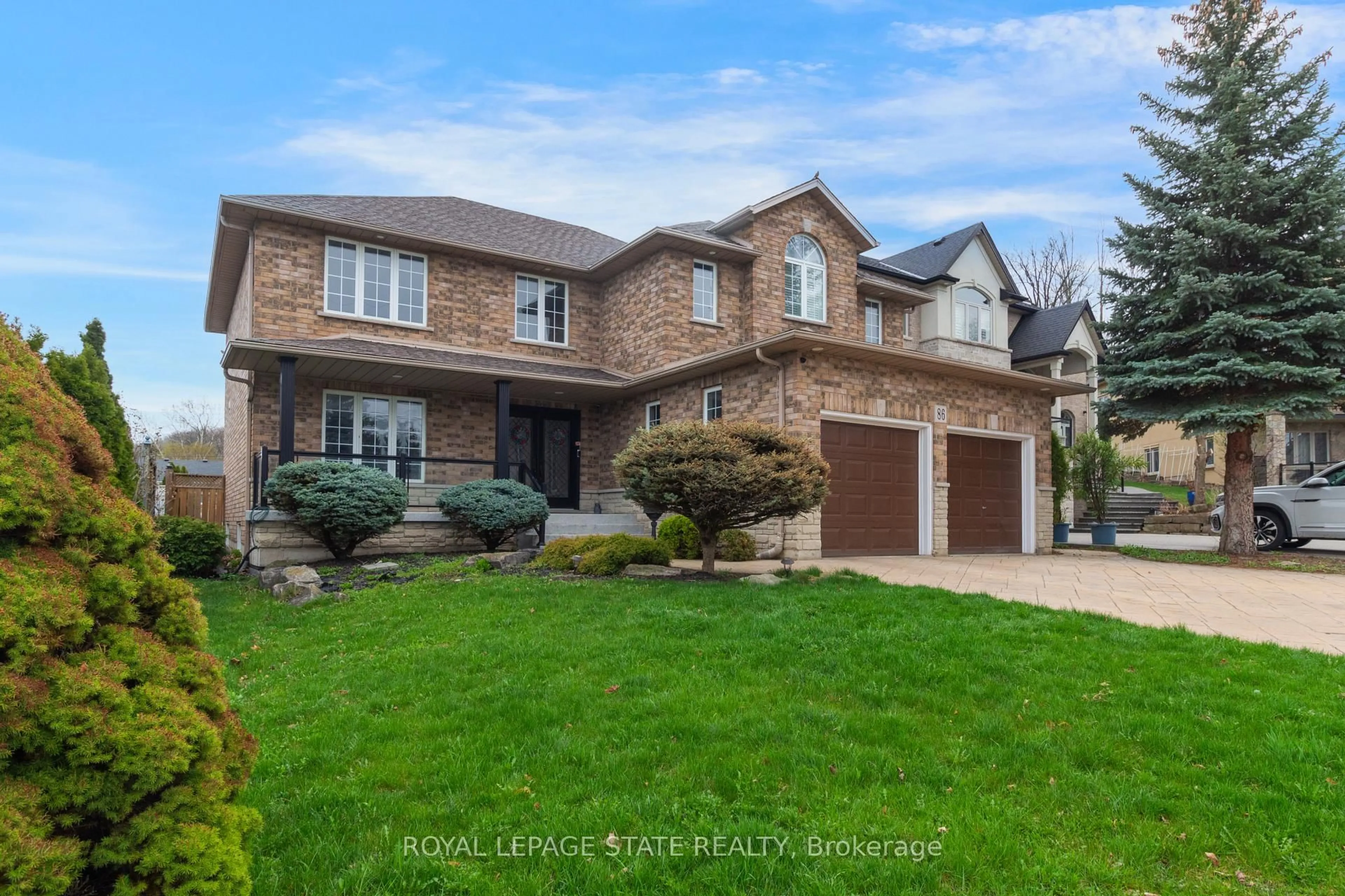 Home with brick exterior material, street for 86 Margaret Ave, Hamilton Ontario L8G 3G5