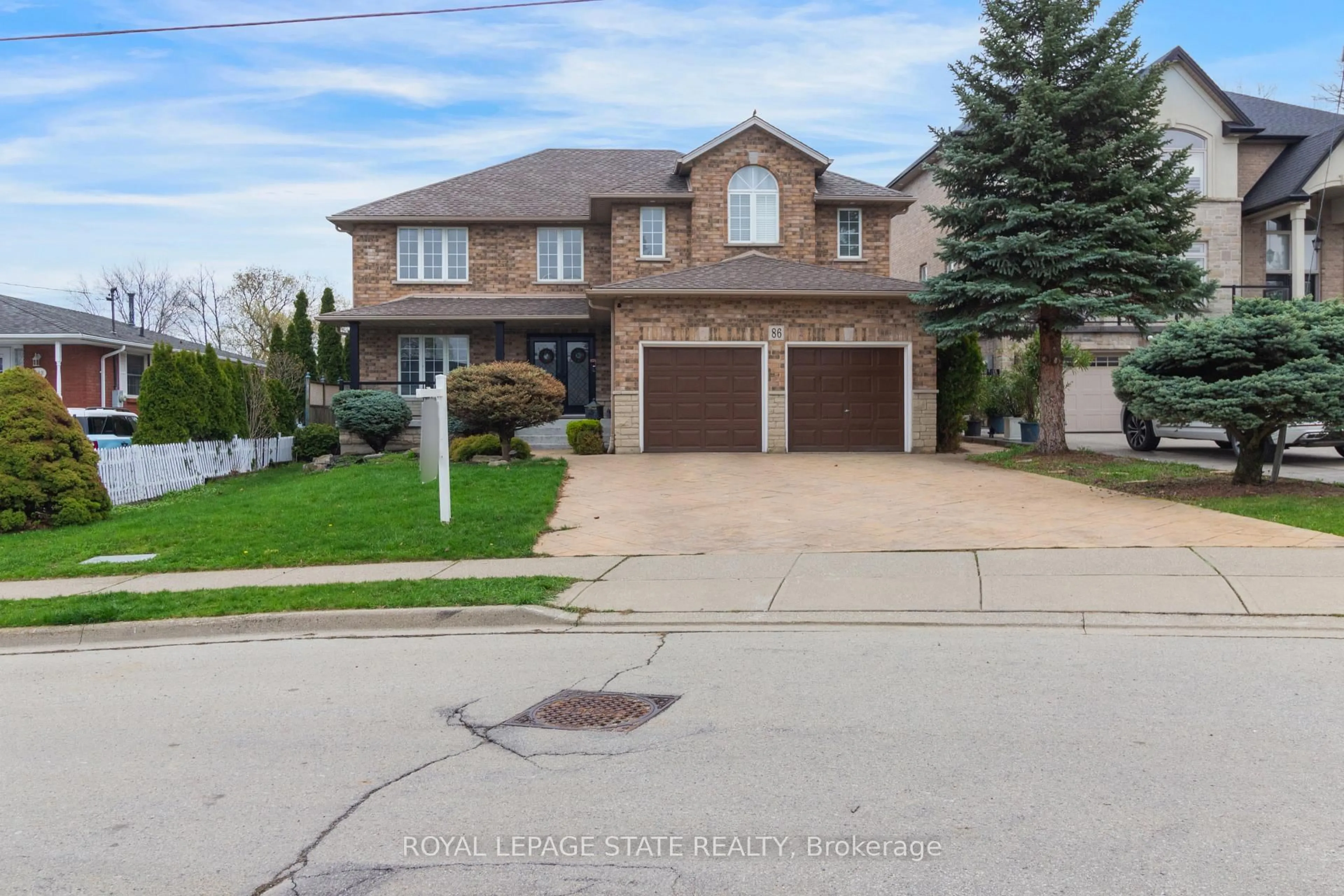 Home with brick exterior material, street for 86 Margaret Ave, Hamilton Ontario L8G 3G5