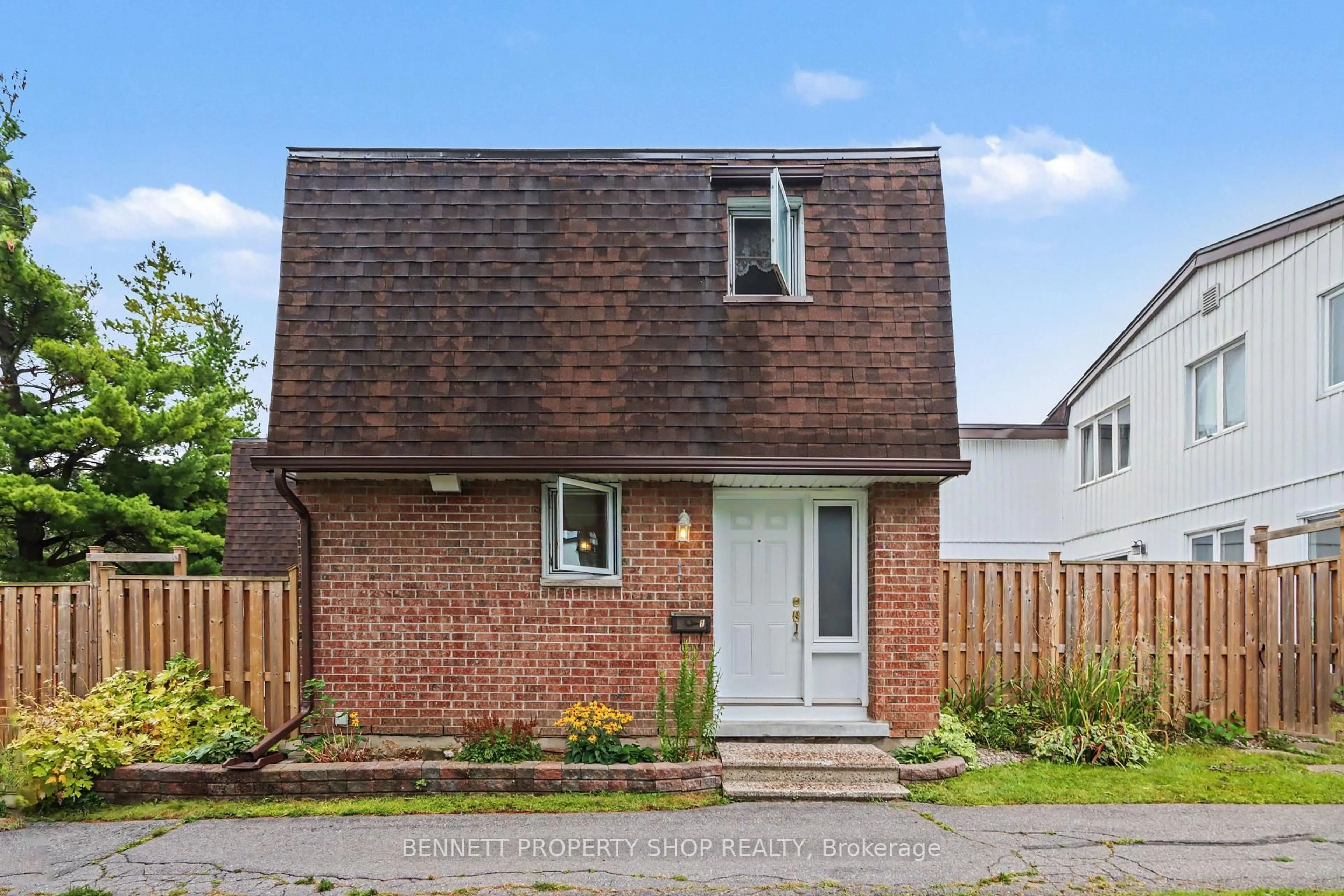Home with brick exterior material, street for 837 Eastvale Dr #1, Ottawa Ontario K1J 7T5