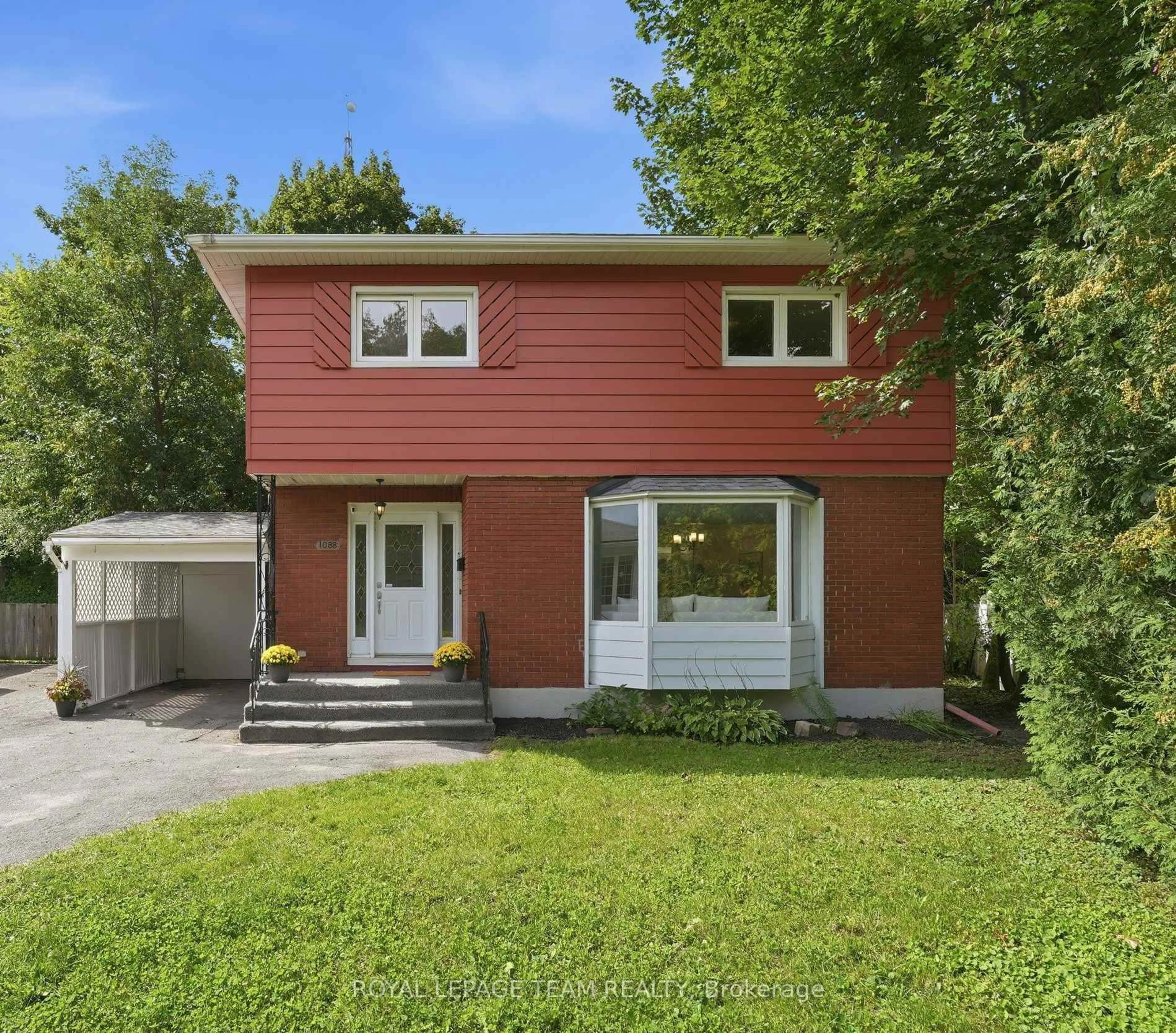 Home with vinyl exterior material, street for 1088 Checkers Rd, Ottawa Ontario K2C 2S4