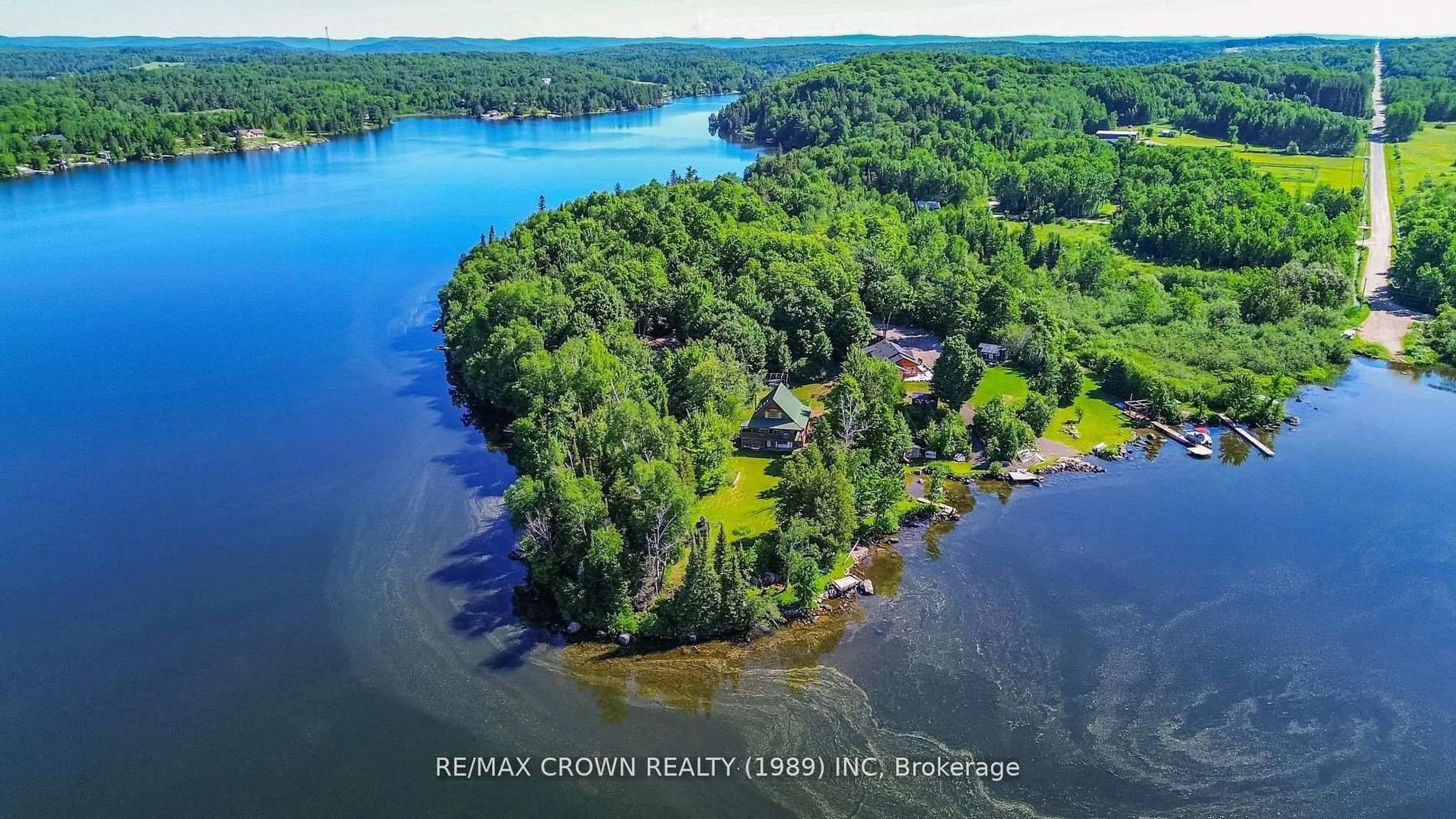 A pic from outside/outdoor area/front of a property/back of a property/a pic from drone, water/lake/river/ocean view for 102 North Star Dr, Bonfield Ontario P0H 1E0