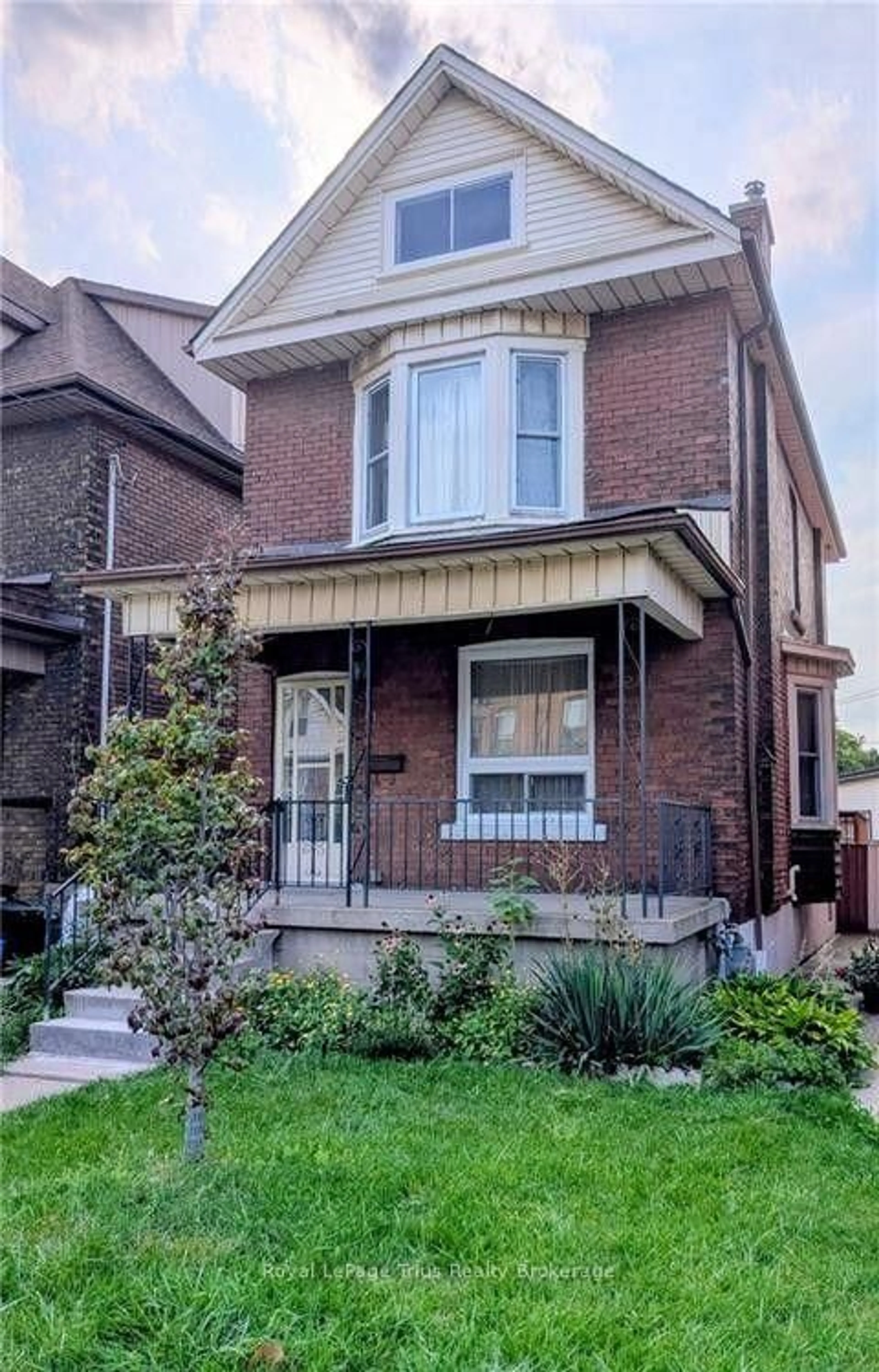 Home with brick exterior material, street for 61 Barnesdale Ave, Hamilton Ontario L8L 6R9