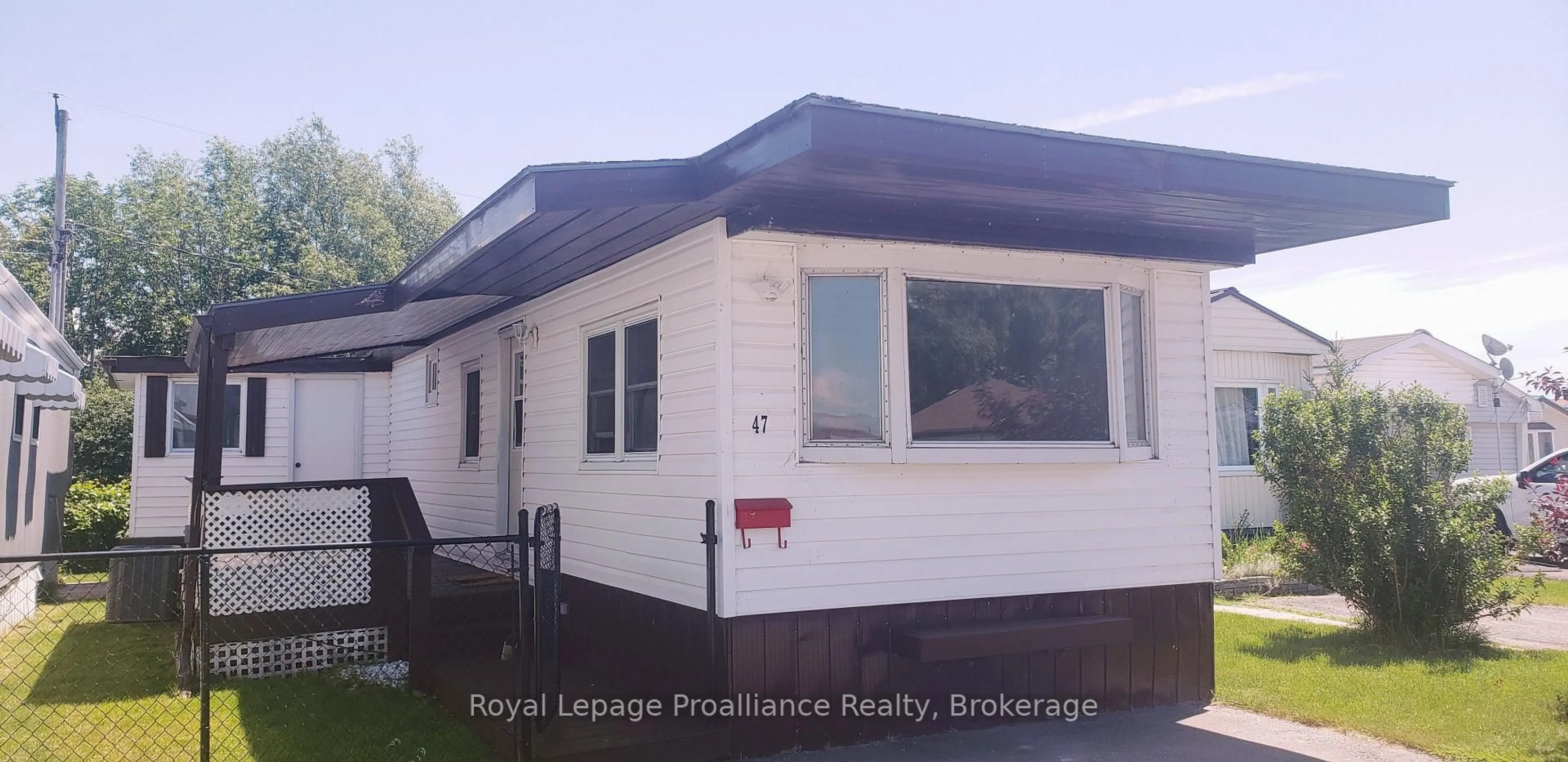 Home with vinyl exterior material, street for 311 Dundas St #47, Quinte West Ontario K8V 3E5