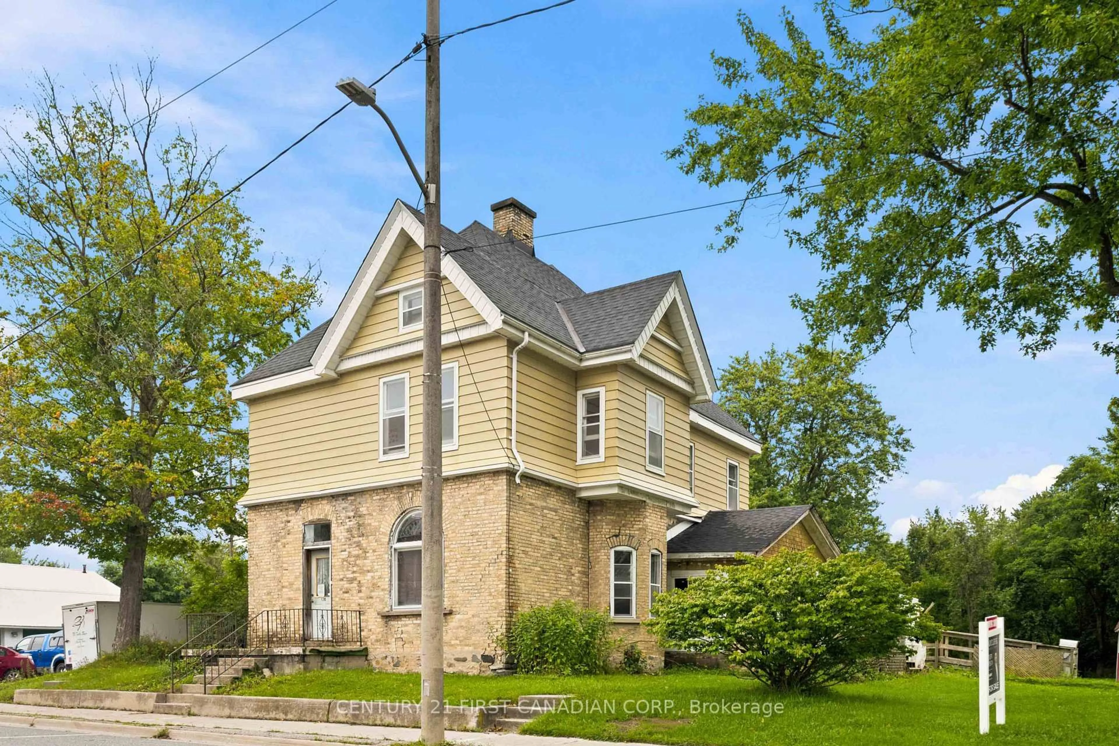 Home with brick exterior material, street for 128 Main St, Lucan Biddulph Ontario N0M 2J0