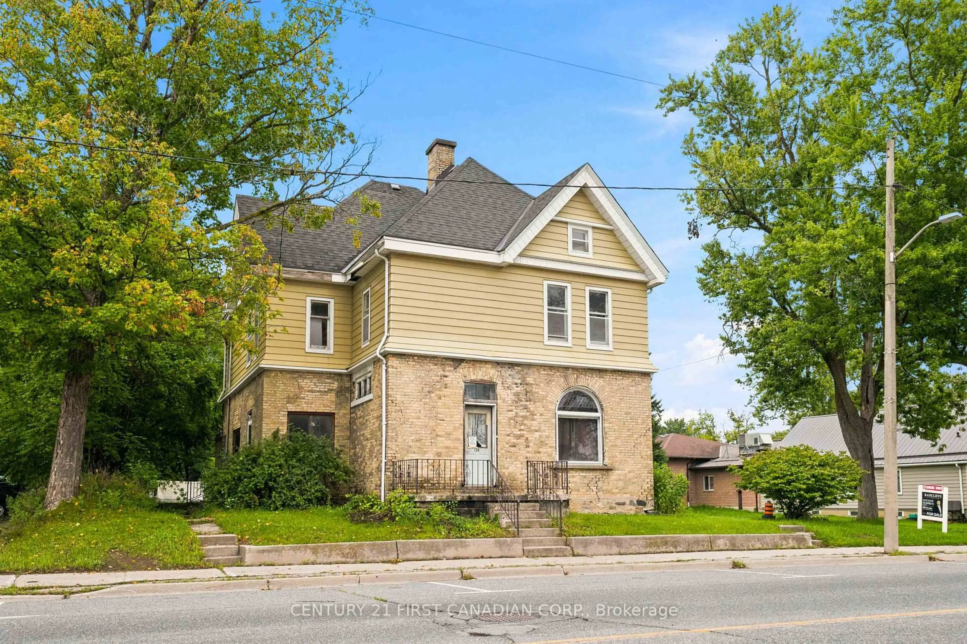 Home with brick exterior material, street for 128 Main St, Lucan Biddulph Ontario N0M 2J0