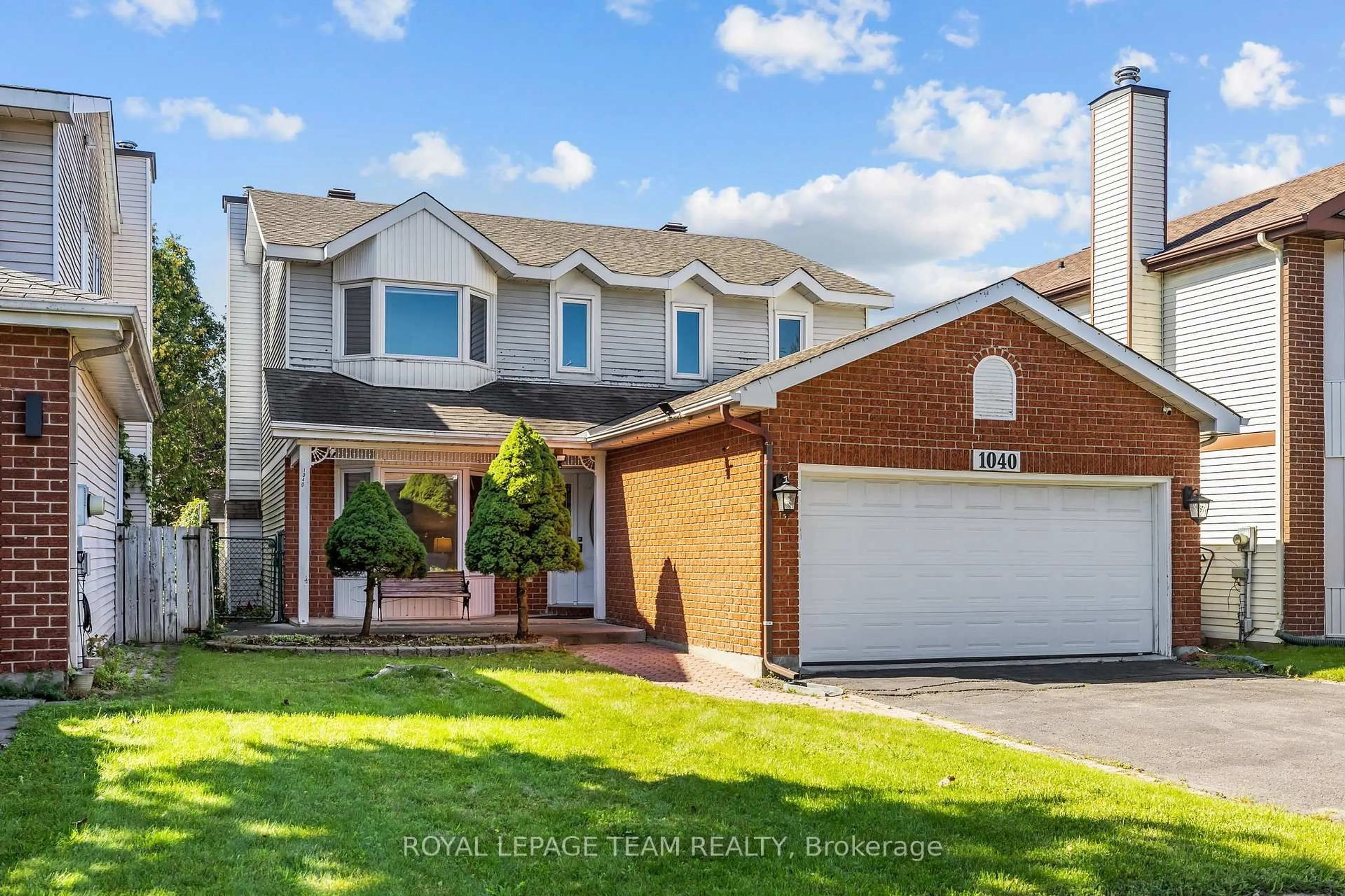 Home with brick exterior material, street for 1040 Karsh Dr, Ottawa Ontario K1G 4M9
