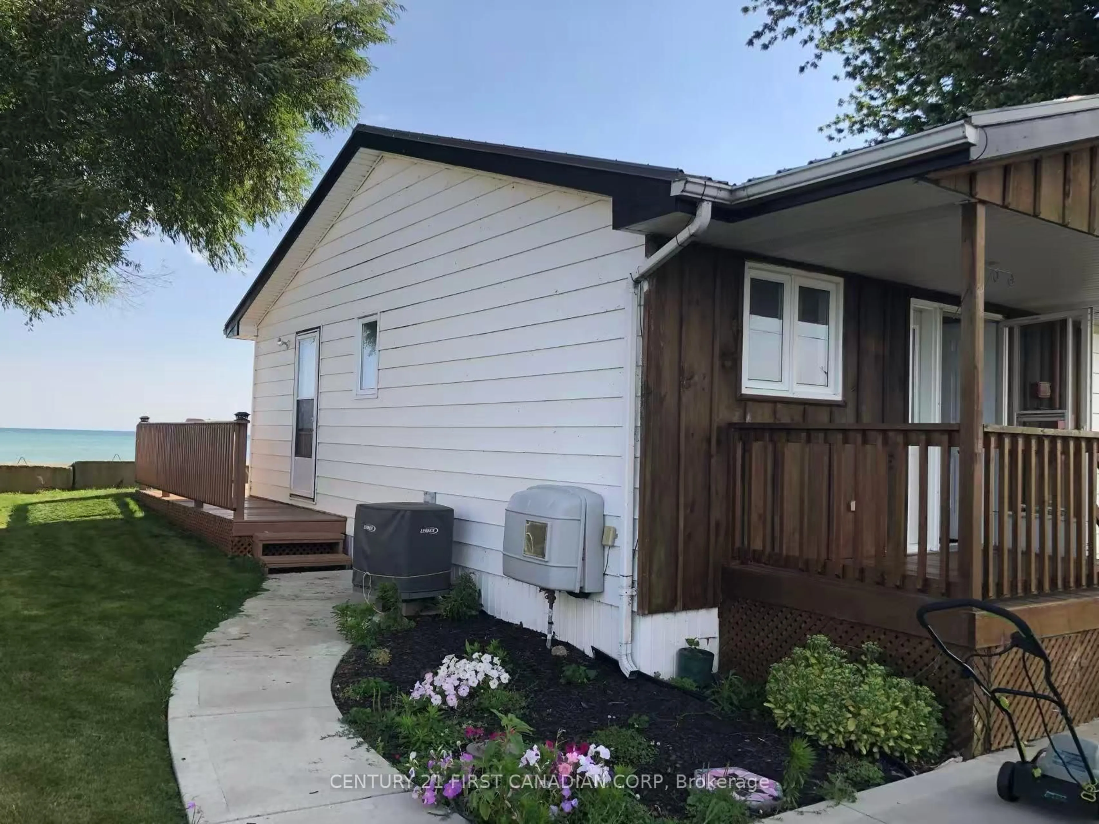 Home with vinyl exterior material, street for 18008 Erie Shore Dr, Chatham-Kent Ontario N0P 1A0
